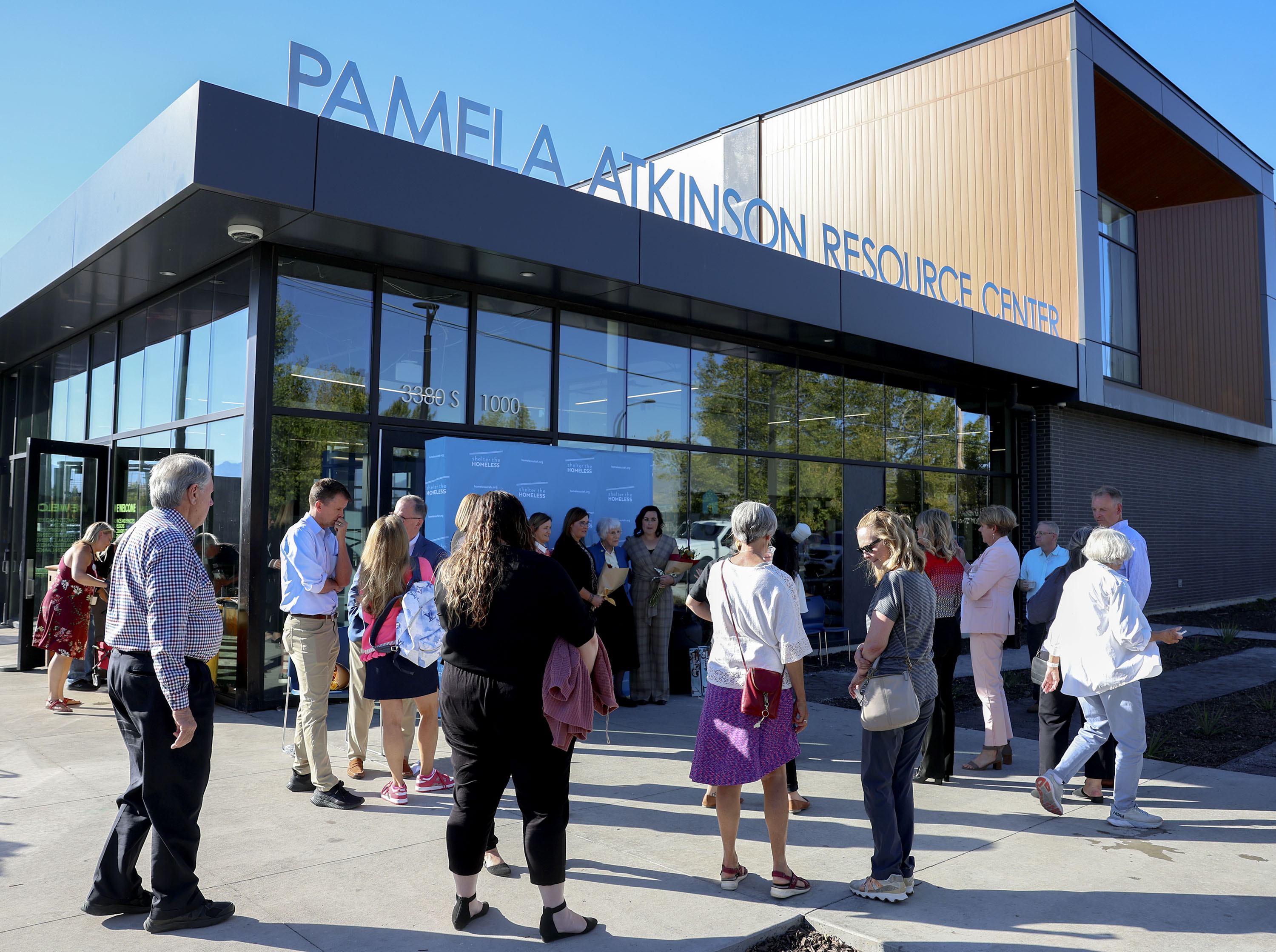 People mingle at the Pamela Atkinson Resource Center in South Salt Lake on Thursday. The facility was formerly known as the Men's Resource Center.