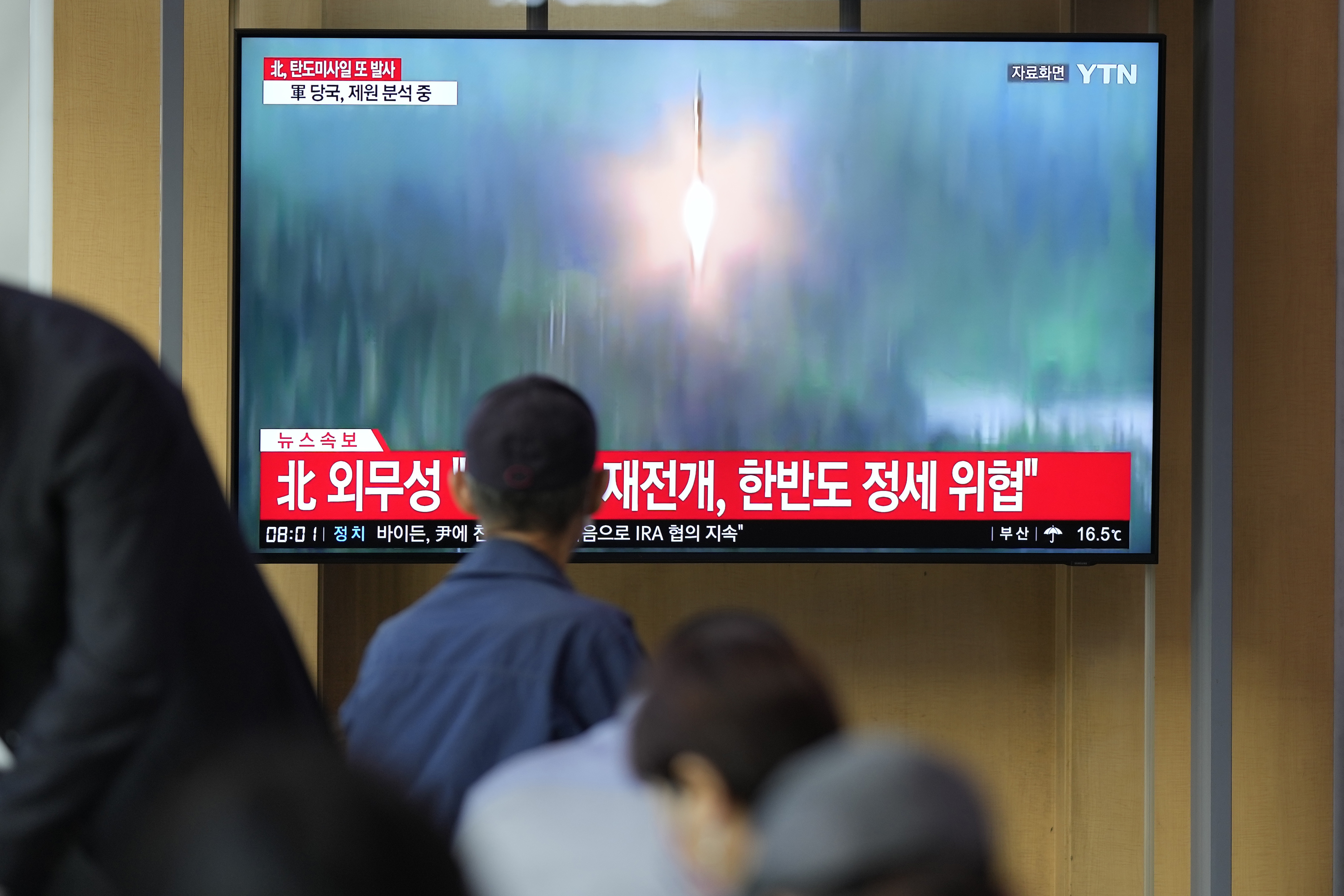 A TV screen showing a news program reporting about North Korea's missile launch with file footage is seen at the Seoul Railway Station in Seoul, South Korea on Thursday. 