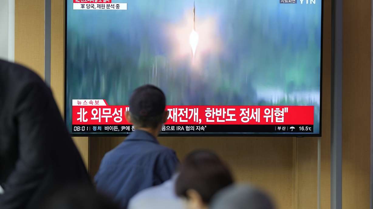 A TV screen showing a news program reporting about North Korea's missile launch with file footage is seen at the Seoul Railway Station in Seoul, South Korea on Thursday.