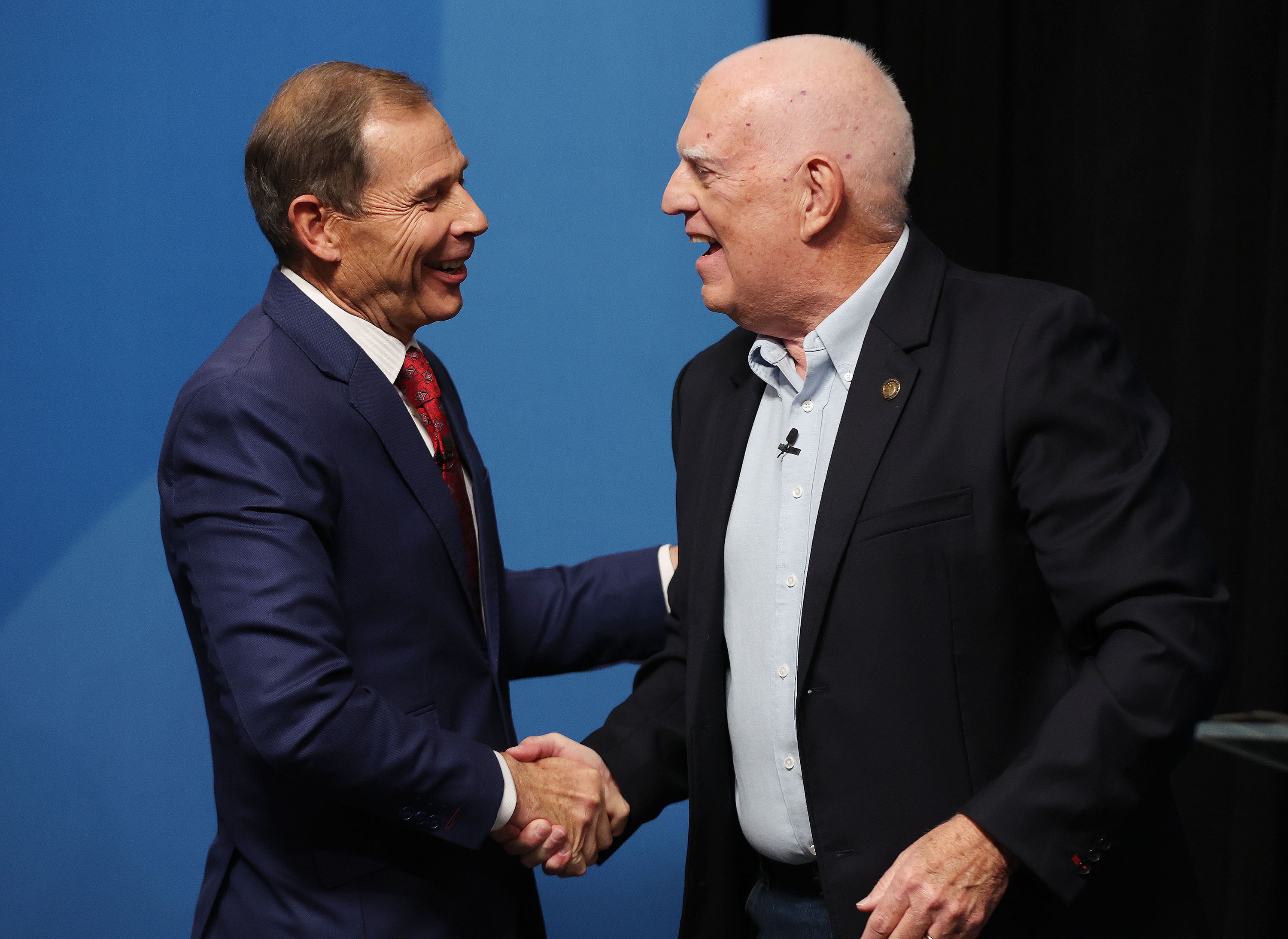 Rep. John Curtis, R-Utah, and Glenn Wright shake hands after debating in the 3rd Congressional District debate at the KBYU Broadcasting building in Provo on Thursday.