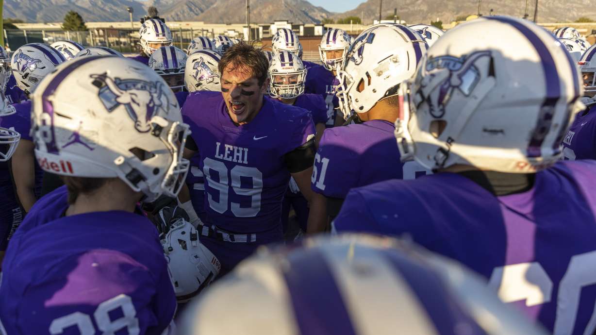 The Lehi Pioneers huddle before playing The Timpview Thunderbirds in Lehi on Thursday, Oct. 6, 2022.