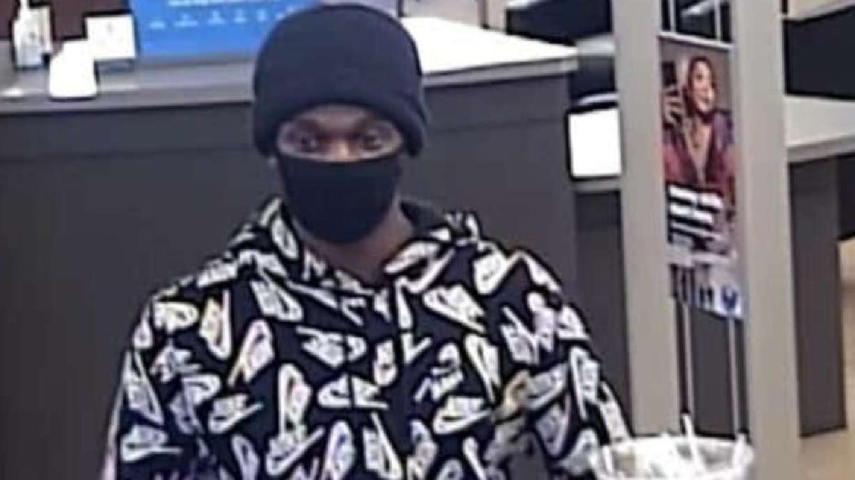 The FBI and local police departments are seeking the public's help in identifying the man pictured here, who they say was involved in a series of robberies in Millcreek, South Salt Lake and Clearfield.