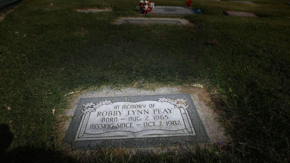 Robby Lynn Peay’s headstone at the Provo City Cemetery in Provo on Wednesday. Provo police are investigating whether a 40-year-old case of a missing 17-year-old is connected to the case of a man shot to death at Arches National Park in 1983.