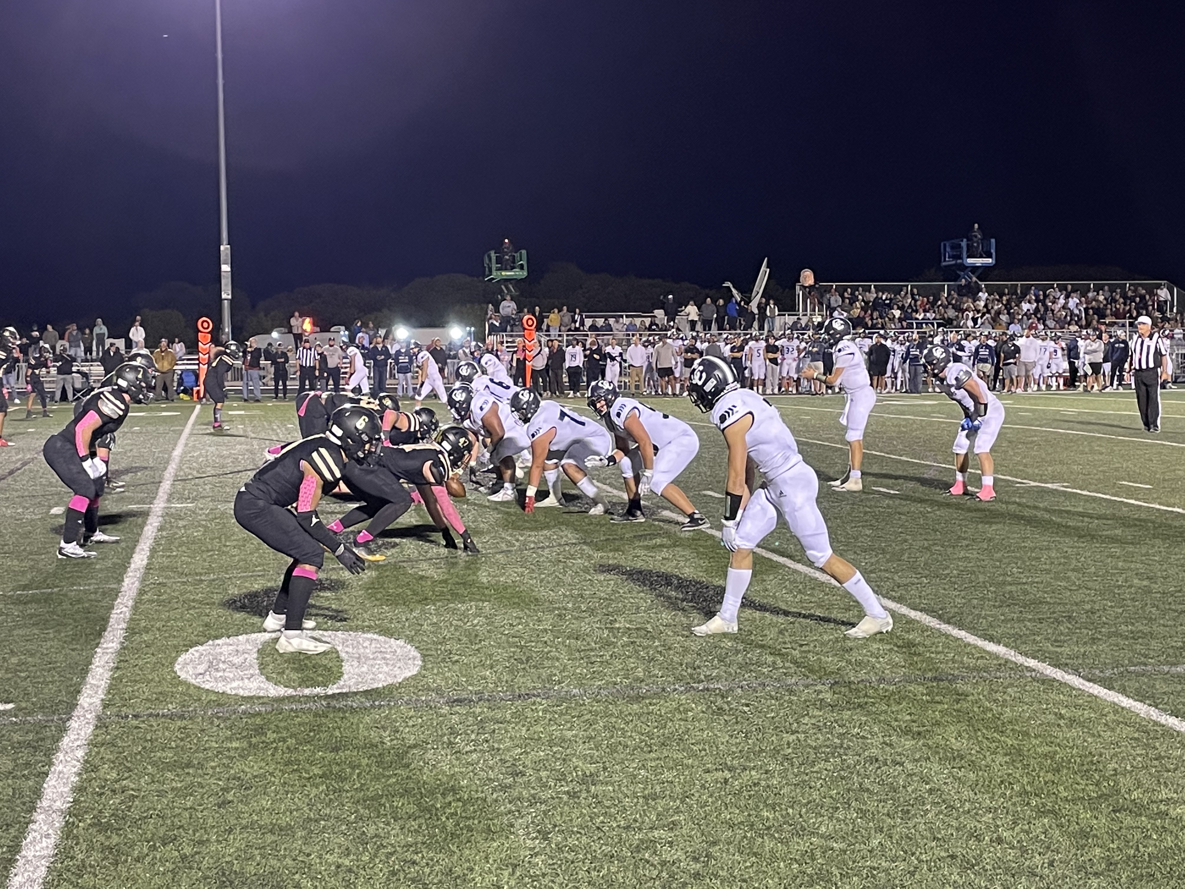 Corner Canyon's offense sets to run a play in a game the Chargers won against Lone Peak, 35-6, on Oct. 7, 2022.