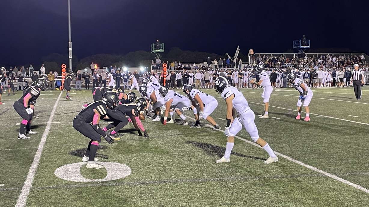 Corner Canyon's offense sets to run a play in a game the Chargers won against Lone Peak, 35-6, on Oct. 7, 2022.