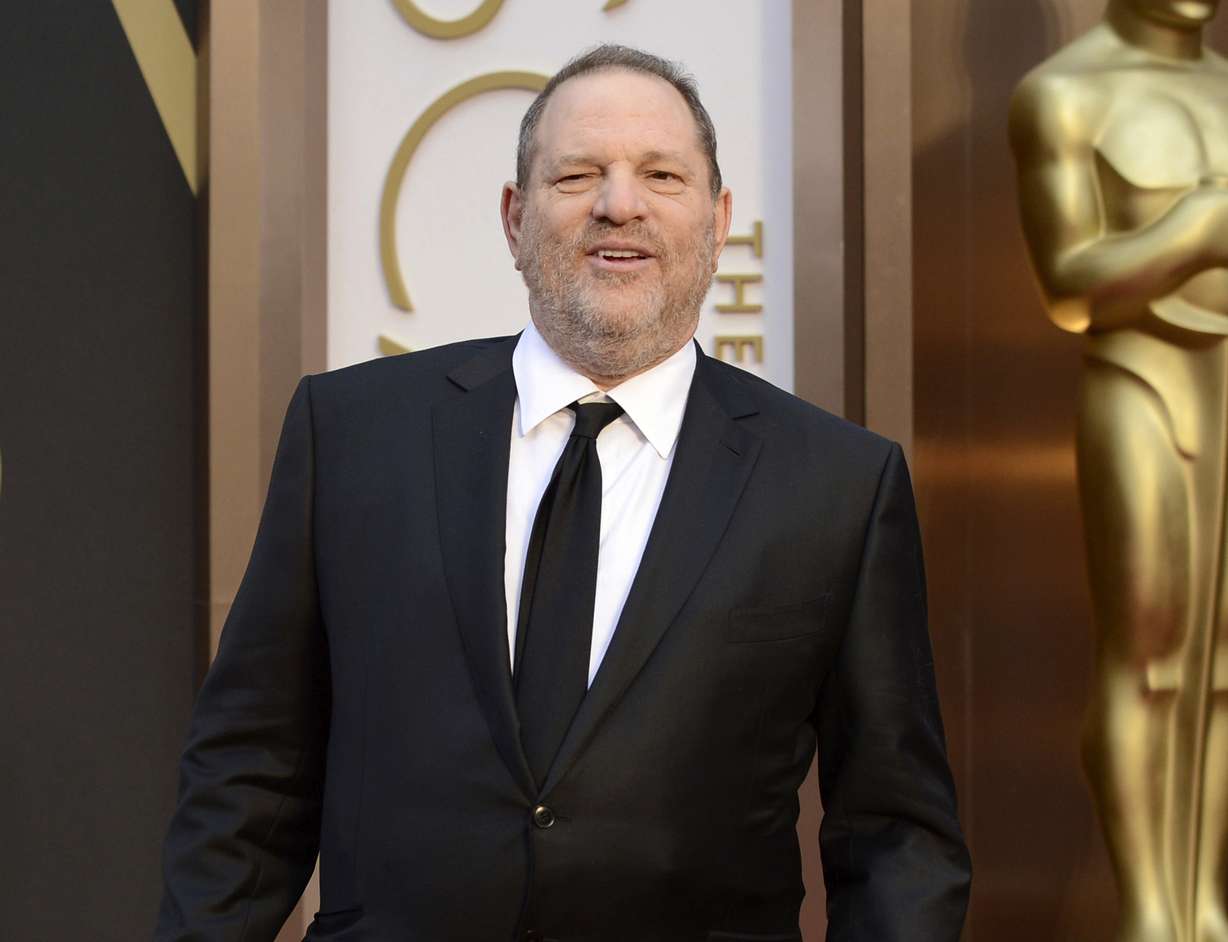 Movie mogul Harvey Weinstein arrives at the Oscars at the Dolby Theatre in Los Angeles, March 2, 2014. Five years after women's stories about him made the #MeToo movement explode, Weinstein is going on trial in Los Angeles, the city where he once was a colossus at the Oscars. Jury selection for an eight-week trial begins Monday, Oct. 10.