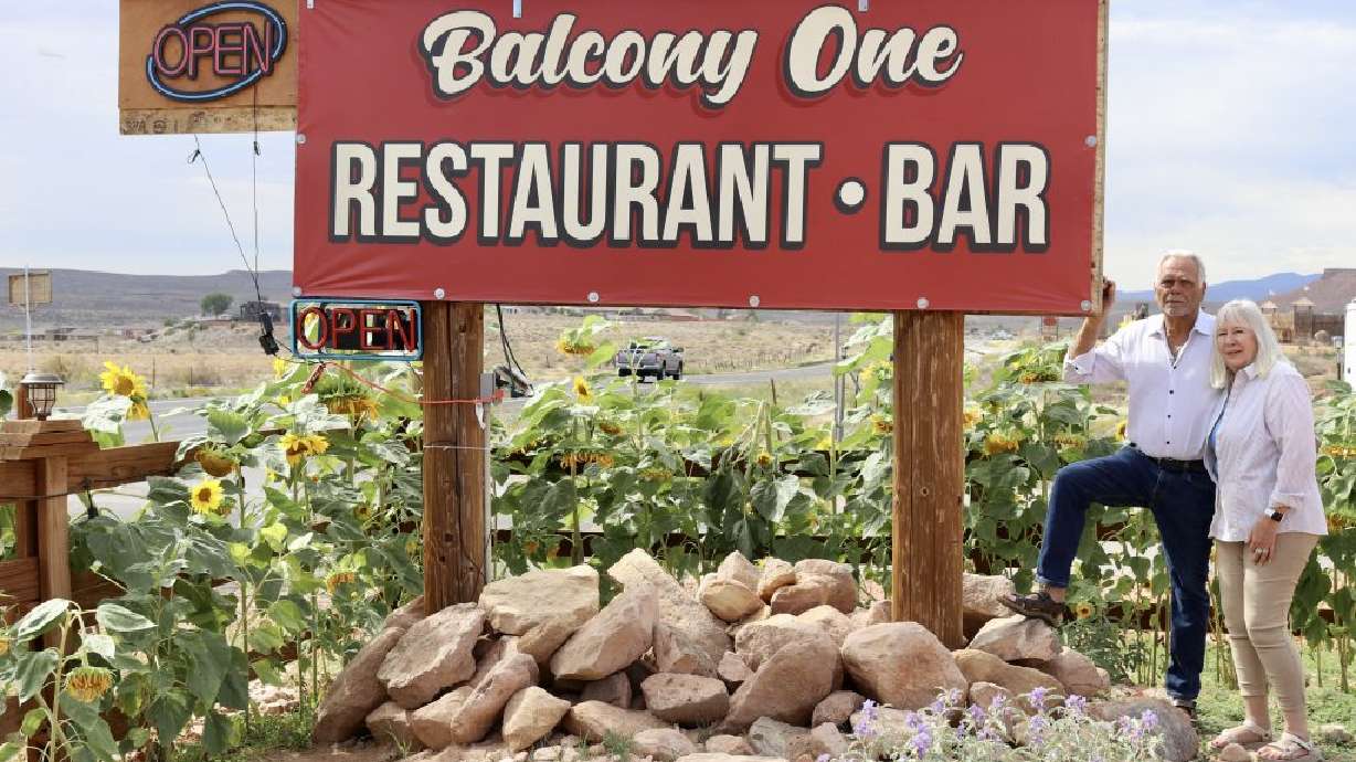 Balcony One owners George and Cindy Rodinos pose in front of their restaurant sign, Virgin, Utah, Sept. 28.