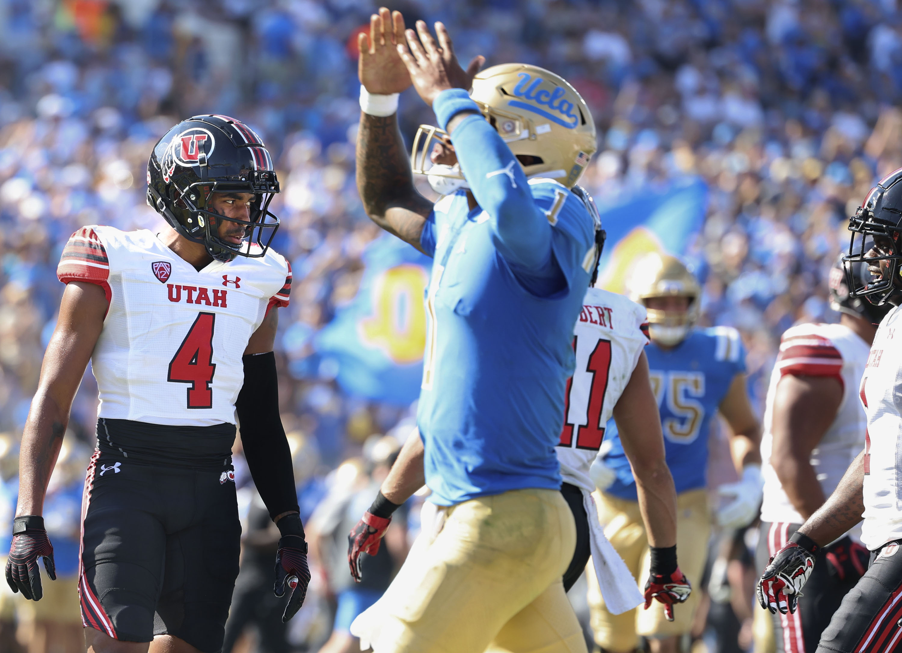 Utah Utes cornerback JaTravis Broughton (4) scowls as UCLA celebrates a touchdown by Bruins wide receiver Jake Bobo (9) at the Rose Bowl in Pasadena, CA, on Saturday, Oct. 8, 2022.