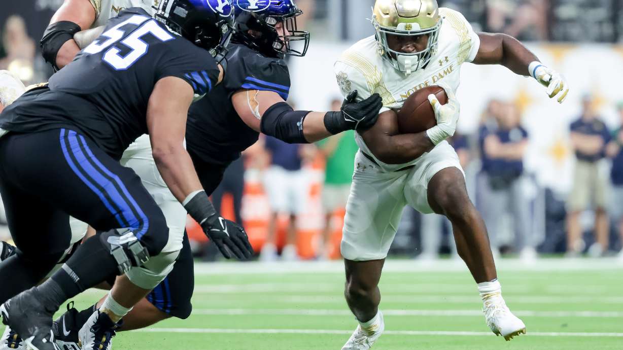 Notre Dame Fighting Irish running back Audric Estime (7) runs the ball during the game against the Brigham Young Cougars at Allegiant Stadium in Las Vegas on Saturday, Oct. 8, 2022.