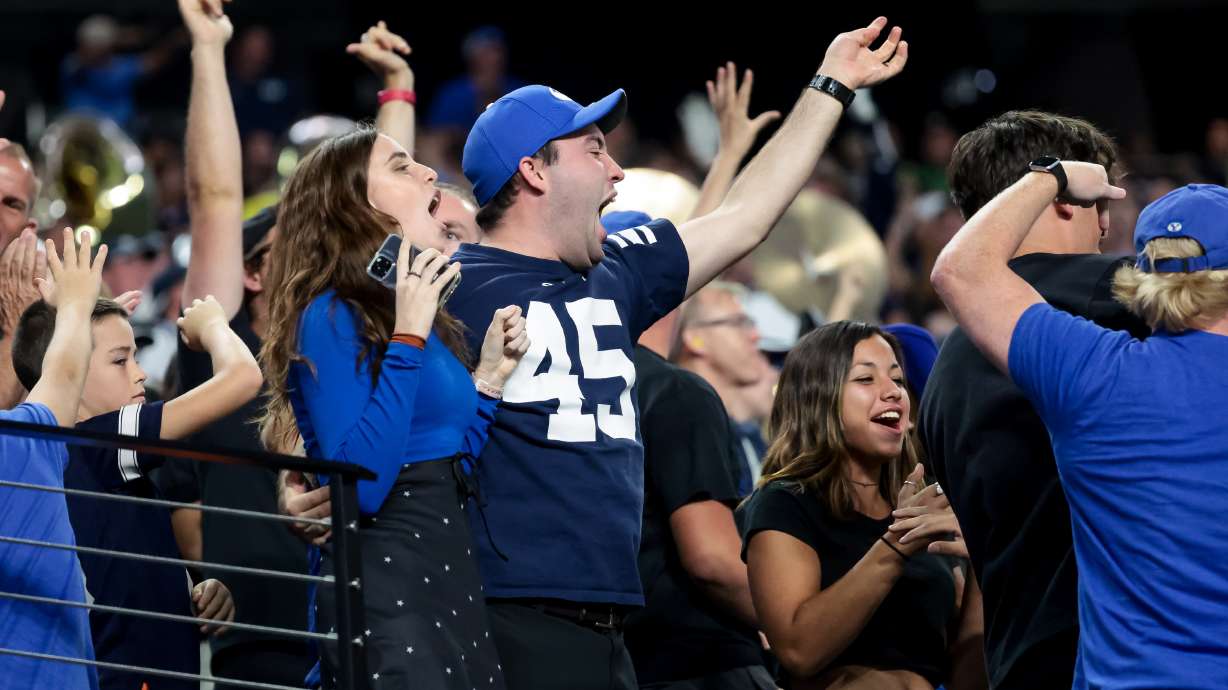 Brigham Young Cougars cheer after scoring against the Notre Dame Fighting Irish at Allegiant Stadium in Las Vegas on Saturday, Oct. 8, 2022.