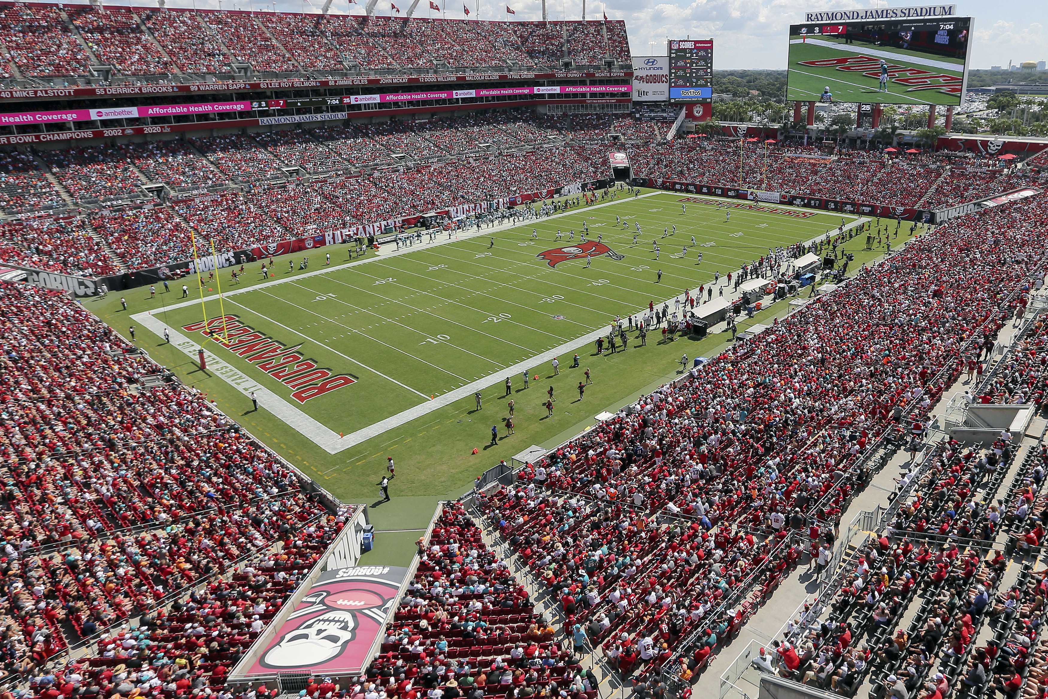 FILE - The Miami Dolphins and Tampa Bay Buccaneers play an NFL football game at Raymond James Stadium in Tampa, Fla., Oct. 10, 2021. A boy ran onto the field and was tackled hard by a security guard in the second quarter of Tampa Bay’s game against Atlanta at Raymond James Stadium in Tampa, Fla., Sunday, Oct. 9, 2022. A woman who identified herself as the child’s mother told The Associated Press the boy is 10 years old. A police officer later told the AP the boy is older than 10, but he couldn't release his information because he's a juvenile. 