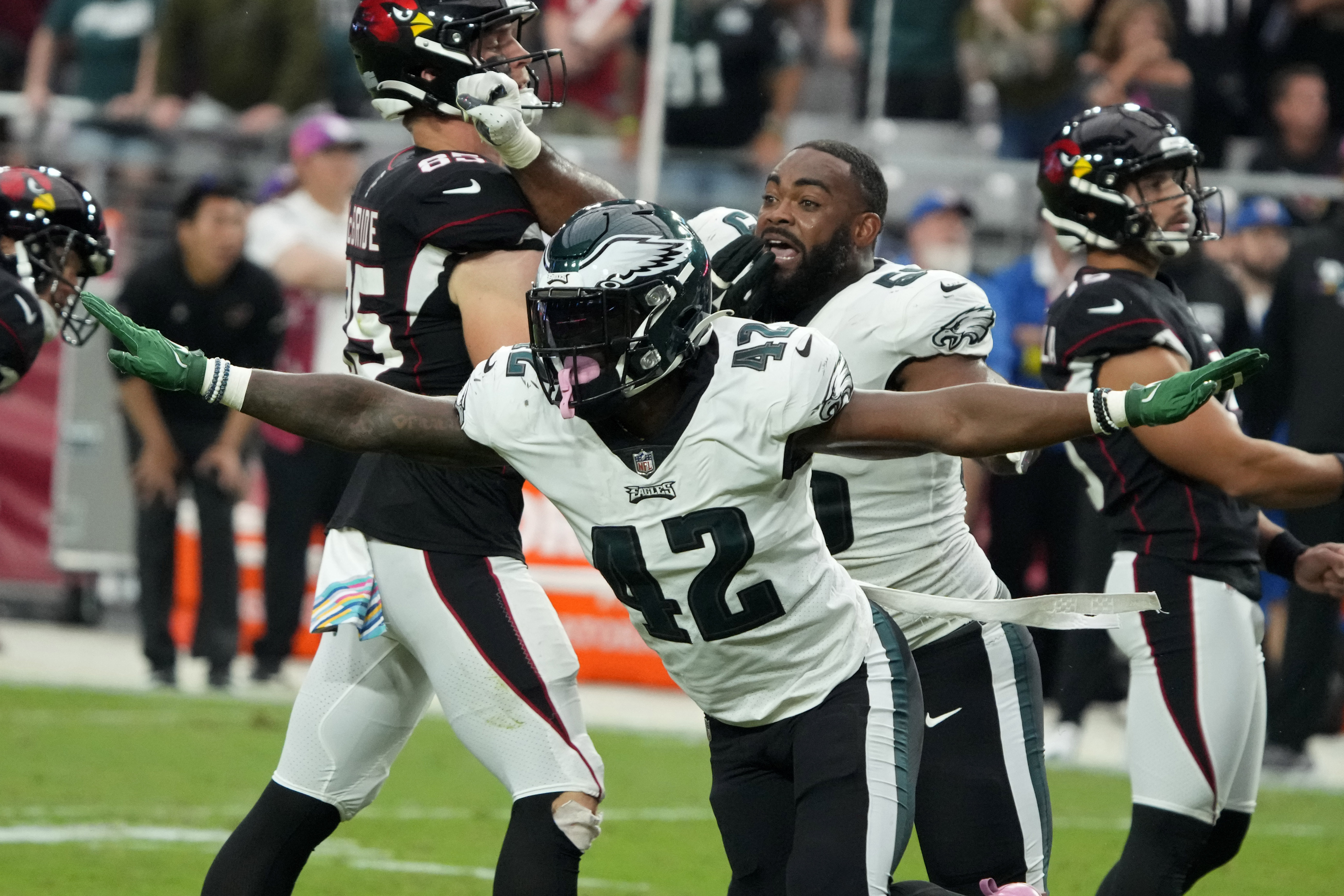 Philadelphia Eagles safety K'Von Wallace (42) celebrates after the Arizona Cardinals missed a field goal attempt during the second half an NFL football game, Sunday, Oct. 9, 2022, in Glendale, Ariz. 