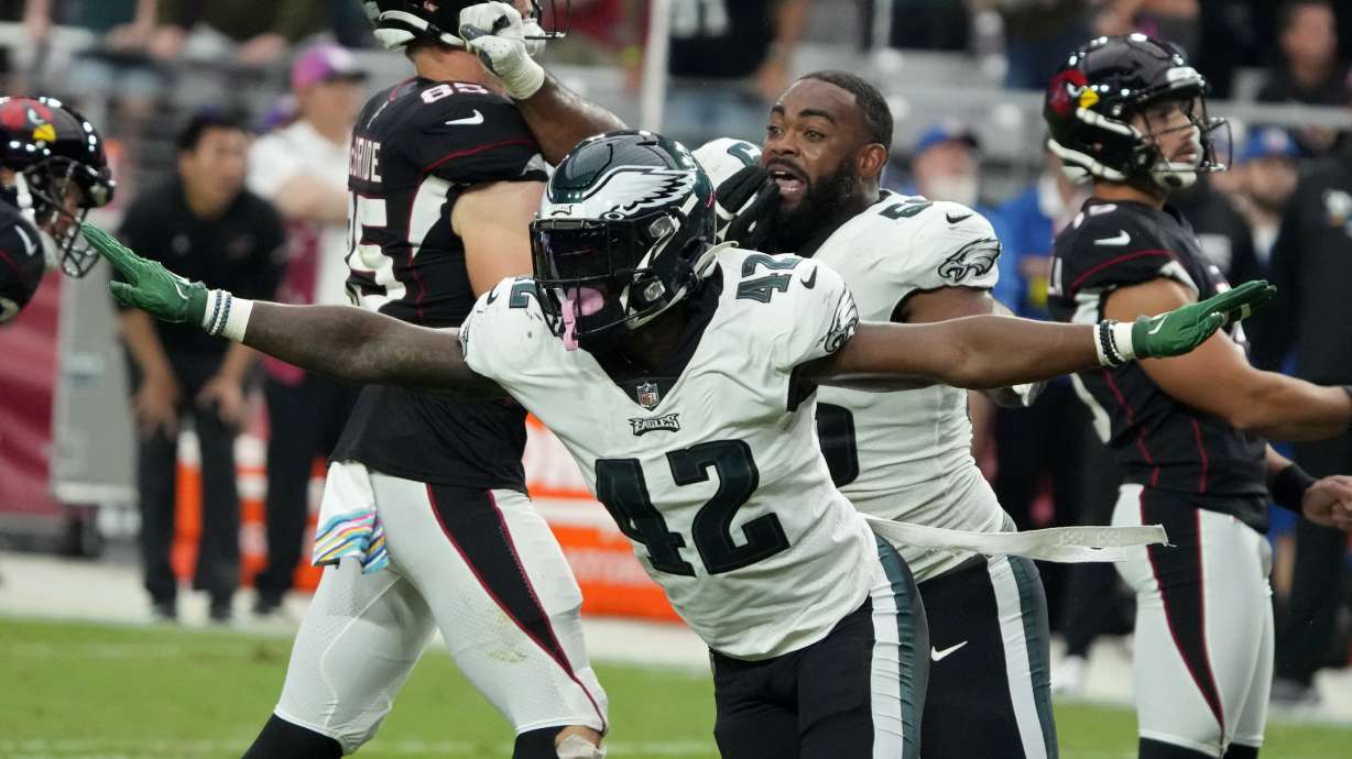 Philadelphia Eagles safety K'Von Wallace (42) celebrates after the Arizona Cardinals missed a field goal attempt during the second half an NFL football game, Sunday, Oct. 9, 2022, in Glendale, Ariz.