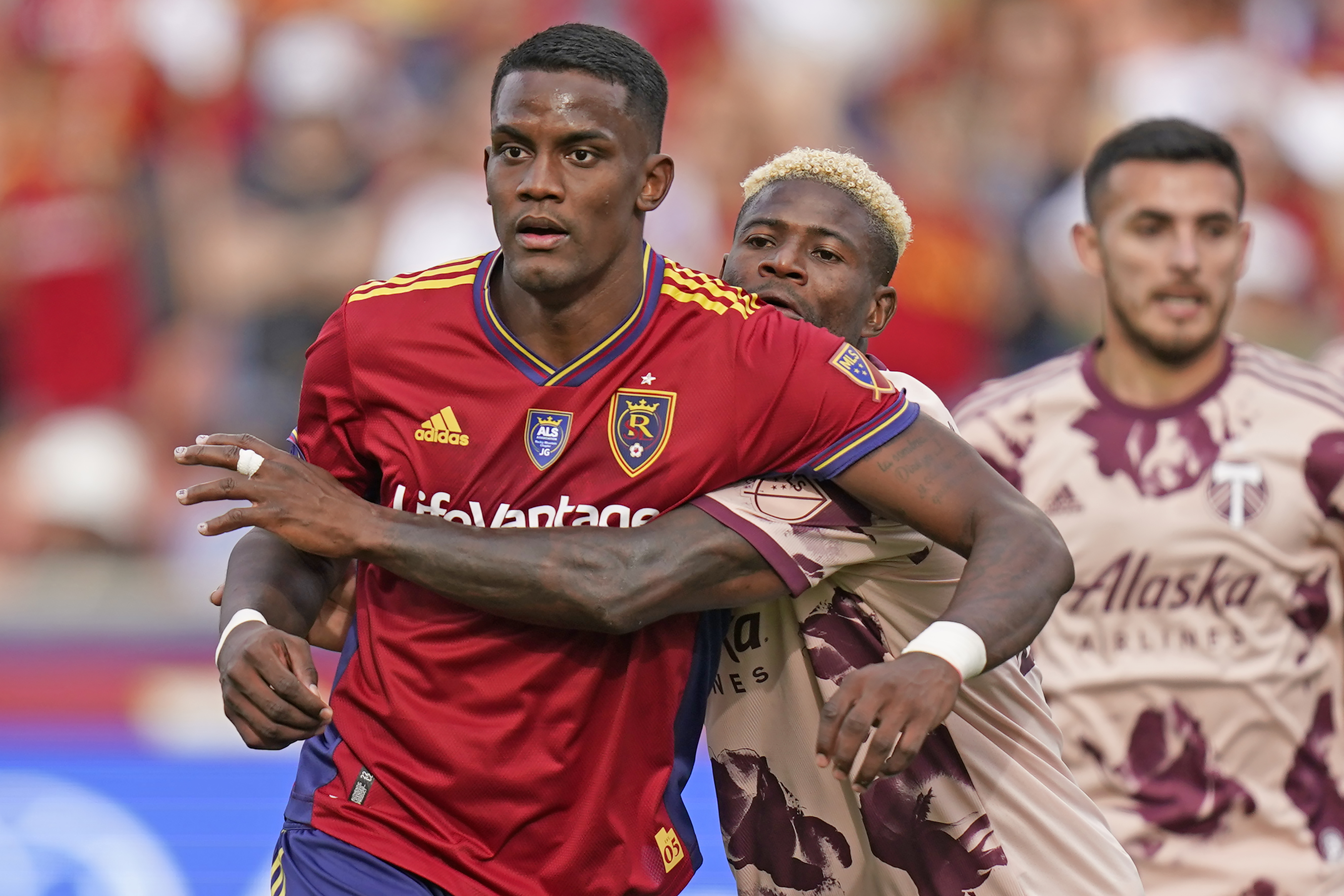 Portland Timbers forward Dairon Asprilla, right, defends against Real Salt Lake forward Sergio Córdova (10) during the second half of an MLS soccer match Sunday, Oct. 9, 2022, in Sandy, Utah. 