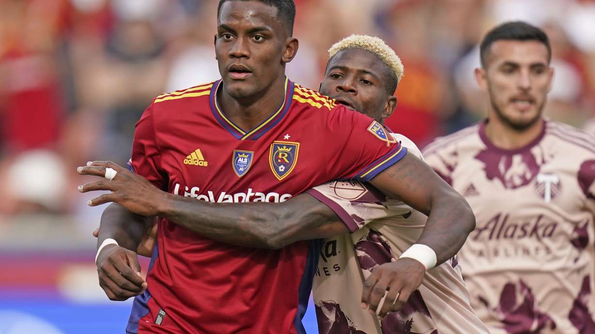 Portland Timbers forward Dairon Asprilla, right, defends against Real Salt Lake forward Sergio Córdova (10) during the second half of an MLS soccer match Sunday, Oct. 9, 2022, in Sandy, Utah.