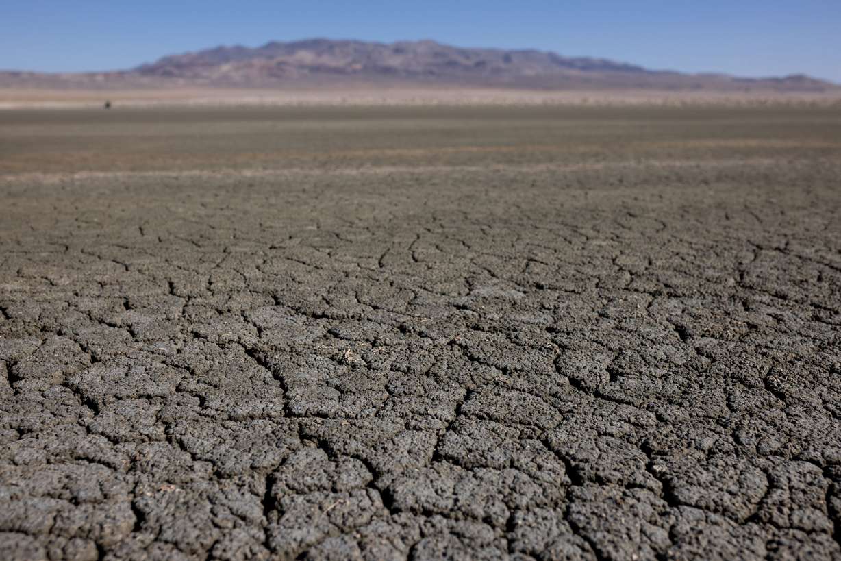 Cracked mud is seen on the dry lakebed of Owens Lake in Inyo County, California, on Wednesday, Aug. 10.