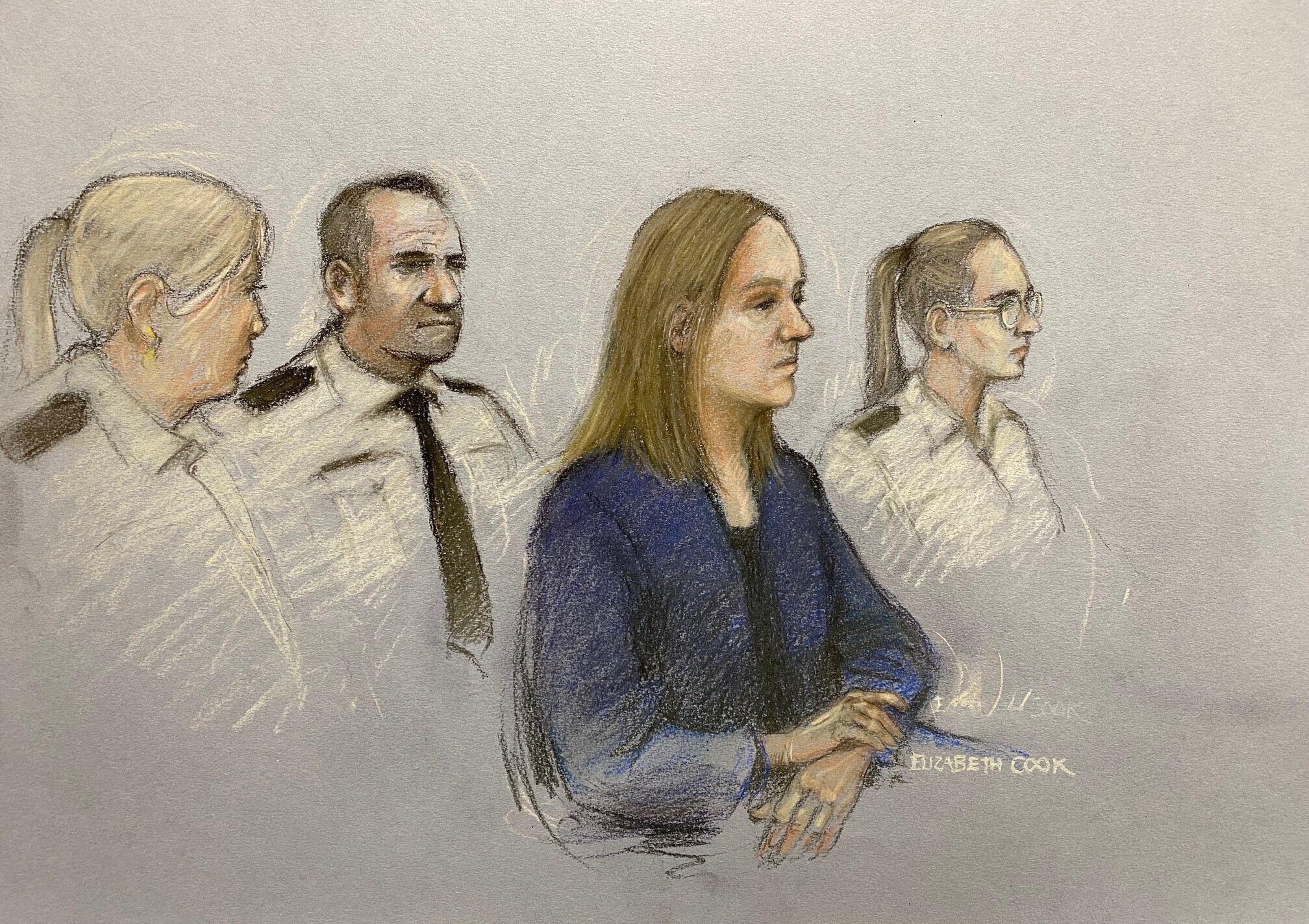A court artist sketch shows Lucy Letby appearing in the dock at Manchester Crown Court, in Manchester, England, Monday. Letby, 32, has been charged with murder in the deaths of five baby boys and two girls, and the attempted murder of five boys and five girls, while she worked at the Countess of Chester Hospital in northwest England between 2015 and 2016. 