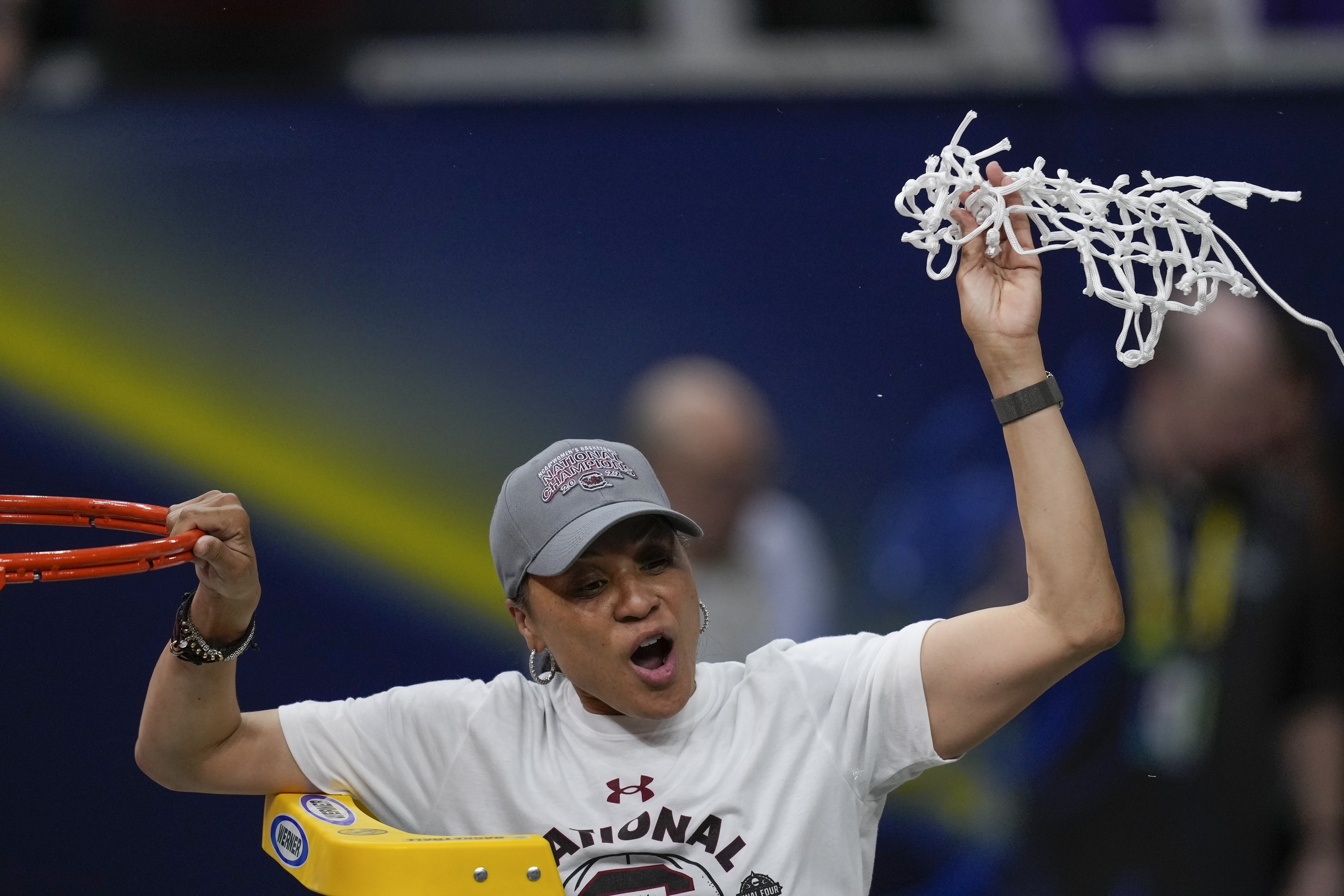 FILE - South Carolina head coach Dawn Staley cuts the net after a college basketball game in the final round of the Women's Final Four NCAA tournament against UConn Sunday, April 3, 2022, in Minneapolis. On Wednesday night, Oct. 12, 2022, Staley will be on the receiving end of more accolades. Staley will accept the Billie Jean King Leadership Award at the Women’s Sports Foundation's Annual Salute to Women in Sports.