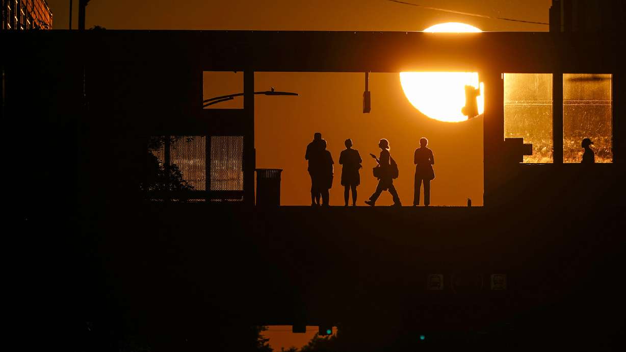 Commuters are pictured at Addison Station in Chicago on Sept. 19. The U.S. economy will soon start losing 175,000 jobs a month, Bank of America warned Monday.
