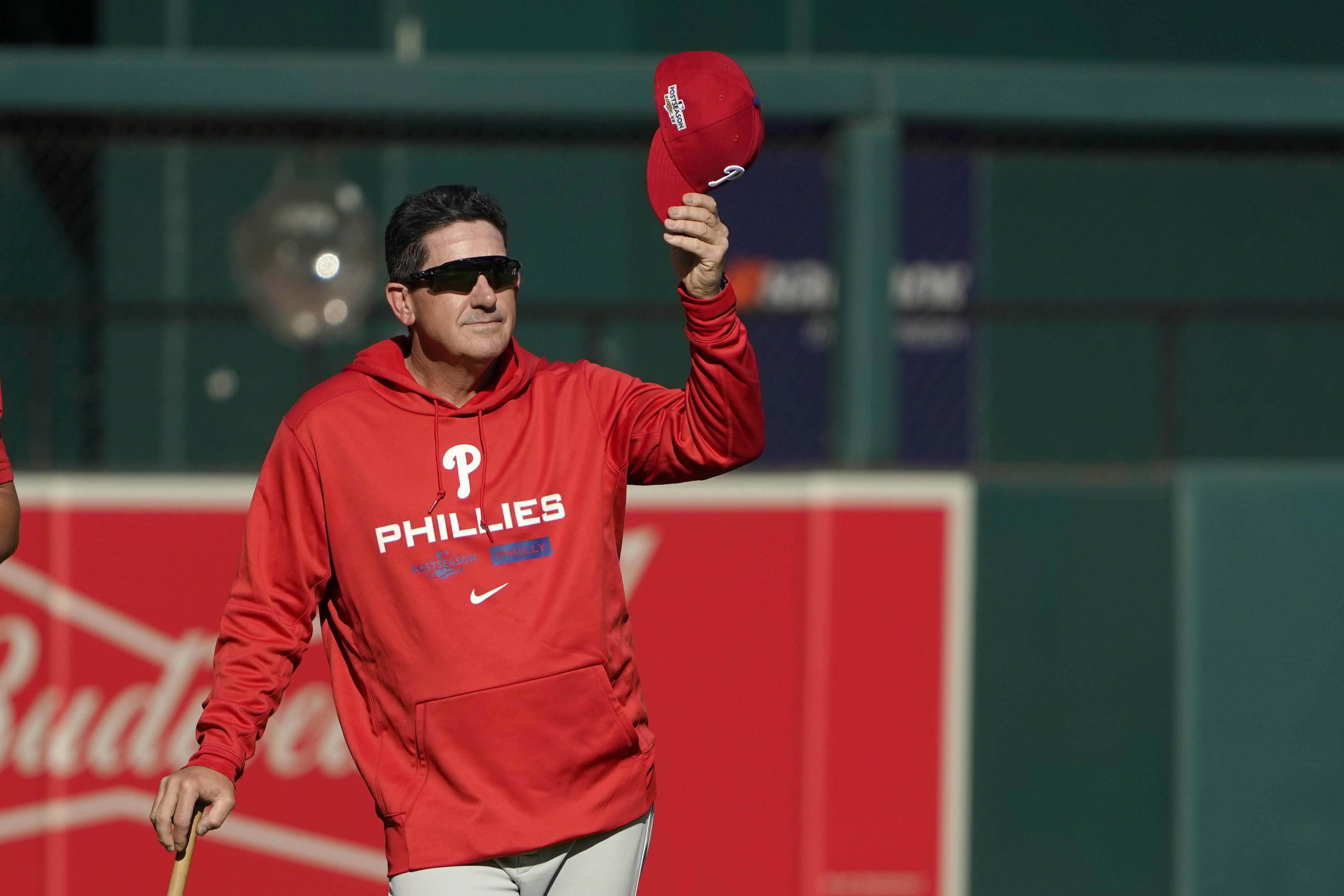 Philadelphia Phillies interim manager Rob Thomson removes his cap during baseball practice Thursday, Oct. 6, 2022, in St. Louis. The Phillies and St. Louis Cardinals are set to play Game 1 of a National League Wild Card baseball playoff series on Friday in St. Louis.