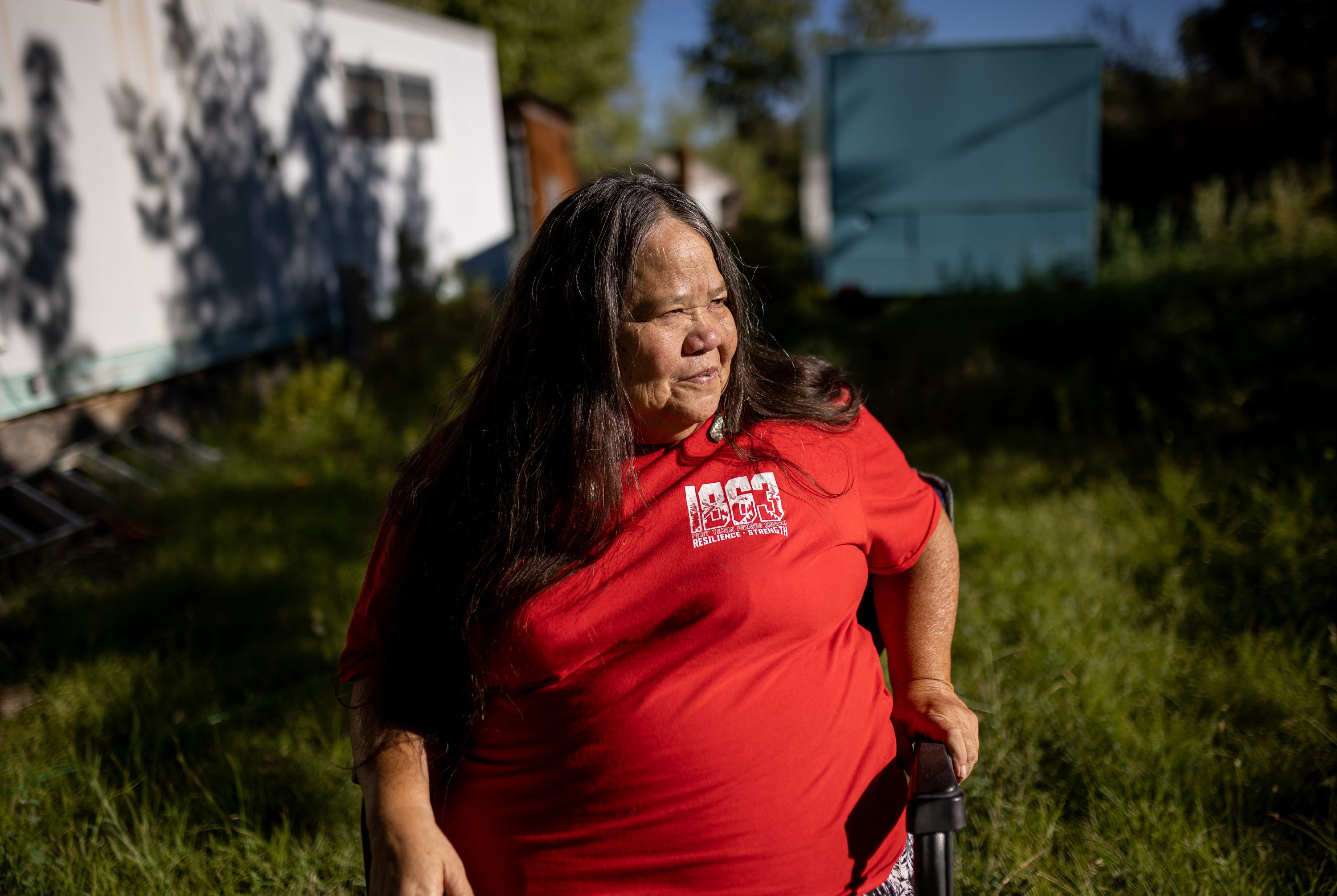 Kathy Jefferson Bancroft, 67, the tribal historic preservation officer for the Lone Pine Paiute-Shoshone Reservation, poses for a photo at her home on the reservation near Lone Pine, California, on Aug. 12.