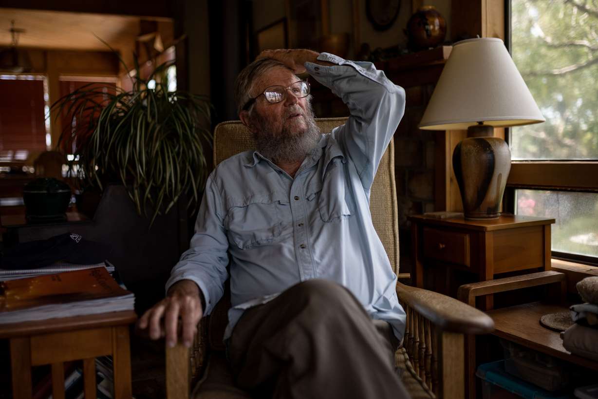 Mike Prather, 75, who has lived near Owens Lake since 1980, sits for a photograph in his home in Alabama Hills, an unincorporated area just outside Lone Pine, Calif., on Aug. 11.