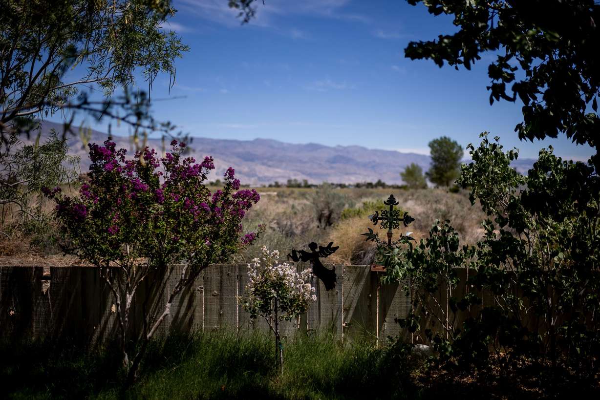 The yard of Nancy and Mike Prather looks toward Owens Lake in Alabama Hills, an unincorporated area just outside Lone Pine, Calif., on Aug. 11.