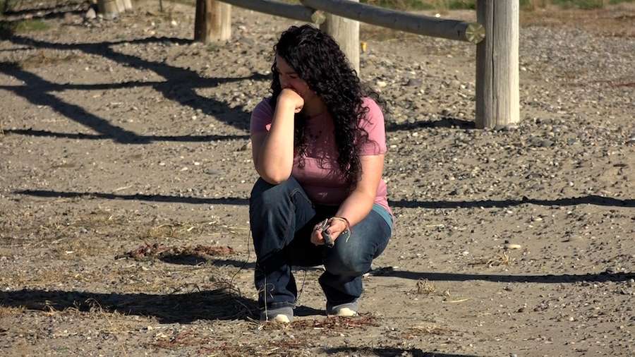 Brandy Jo Furniss becomes emotional while visiting the site of a crash where she was seriously injured in Idaho Falls, Idaho, in 2019.