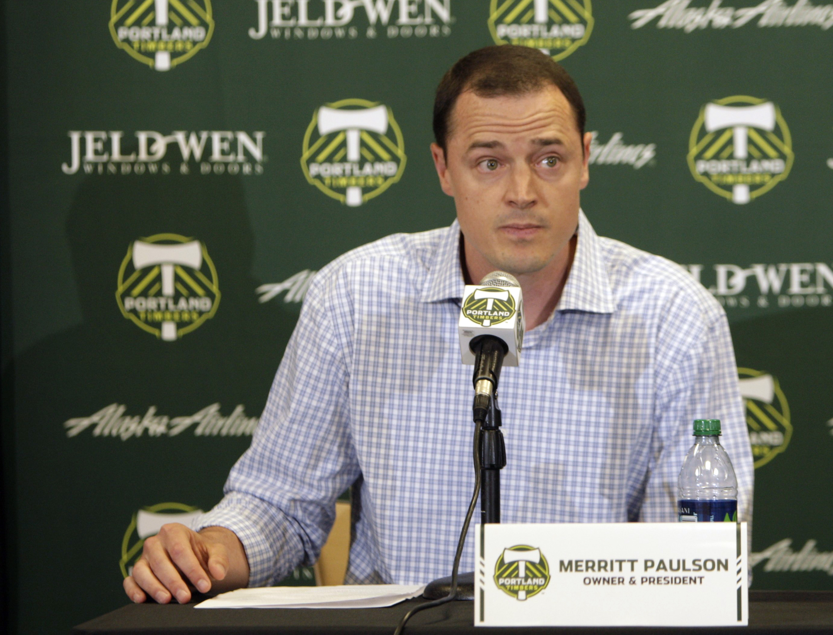 FILE - Portland Timbers president Merritt Paulson speaks during a soccer news conference announcing the firing of Timbers coach John Spencer on July 9, 2012, in Portland, Ore. Paulson, who also owns the Portland Thorns women soccer team, has removed himself from a decision-making role with the National Women’s Soccer League club until the findings are released from an ongoing investigation into numerous scandals around the league.  