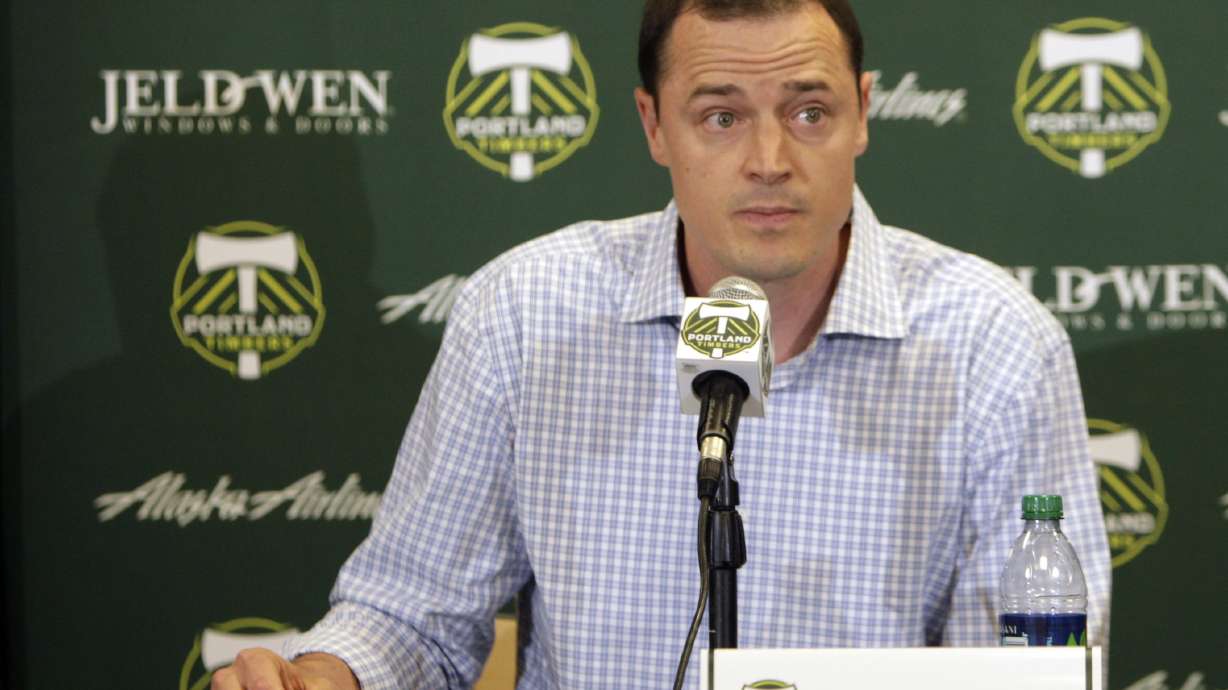 FILE - Portland Timbers president Merritt Paulson speaks during a soccer news conference announcing the firing of Timbers coach John Spencer on July 9, 2012, in Portland, Ore. Paulson, who also owns the Portland Thorns women soccer team, has removed himself from a decision-making role with the National Women’s Soccer League club until the findings are released from an ongoing investigation into numerous scandals around the league.