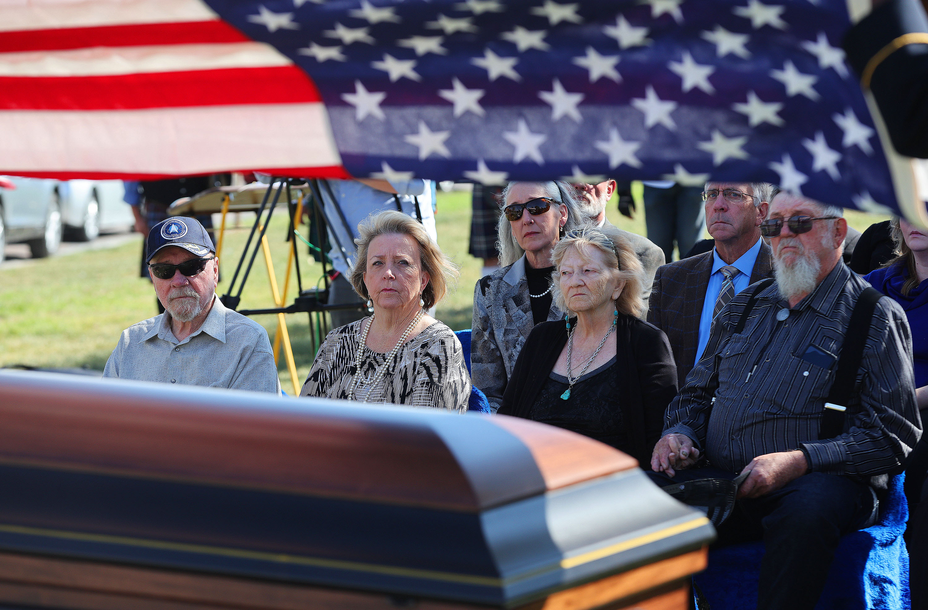 Frank and Kristie Moe, left, and Kayce and Joe Phillips attend the graveside services for U.S. Army Air Force Sgt. Elvin L. Phillips at Utah Veterans Cemetery and Memorial Park in Bluffdale on Tuesday. Phillips was killed during World War II after being shot down in a B-24 Liberator over Romania. Phillips remains were just recently identified.