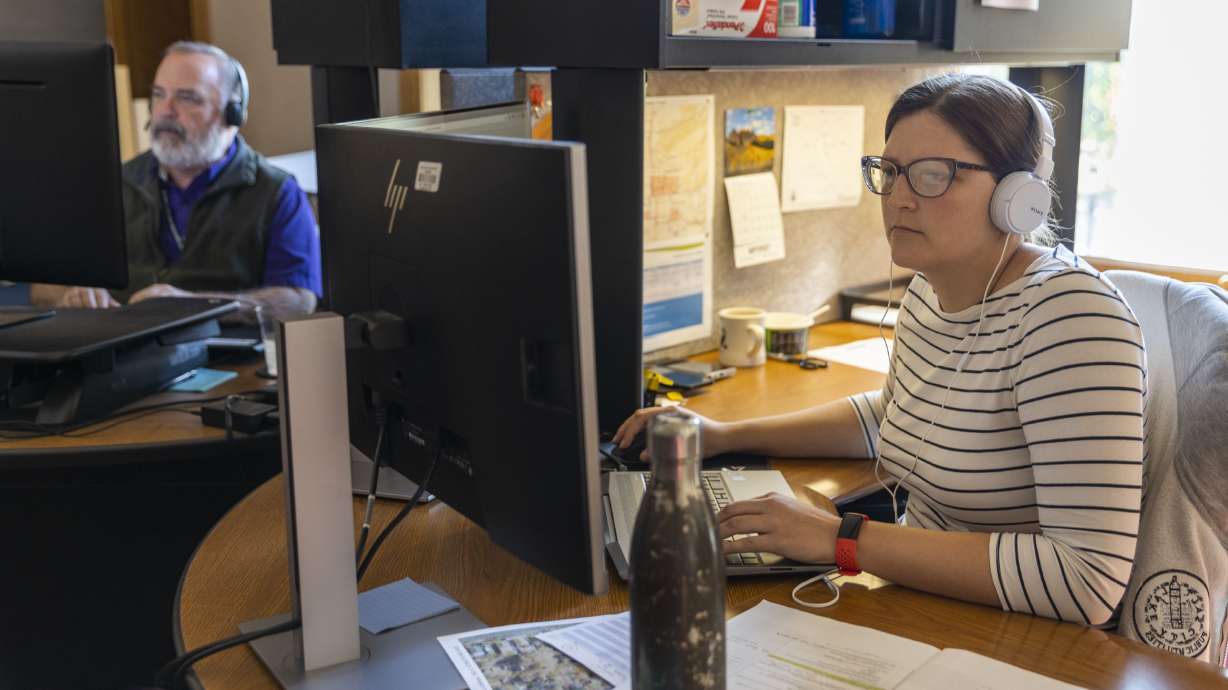 Andrea Osojnak, an Engineer IV, works at her desk inside of the Salt Lake City and County Building in Salt Lake City on Tuesday. Seismic impacts on the function and philosophy of where we do our work, first wrought by COVID-19 pandemic restrictions, continue to be felt by business owners and employees as new definitions of the workplace are still being written.