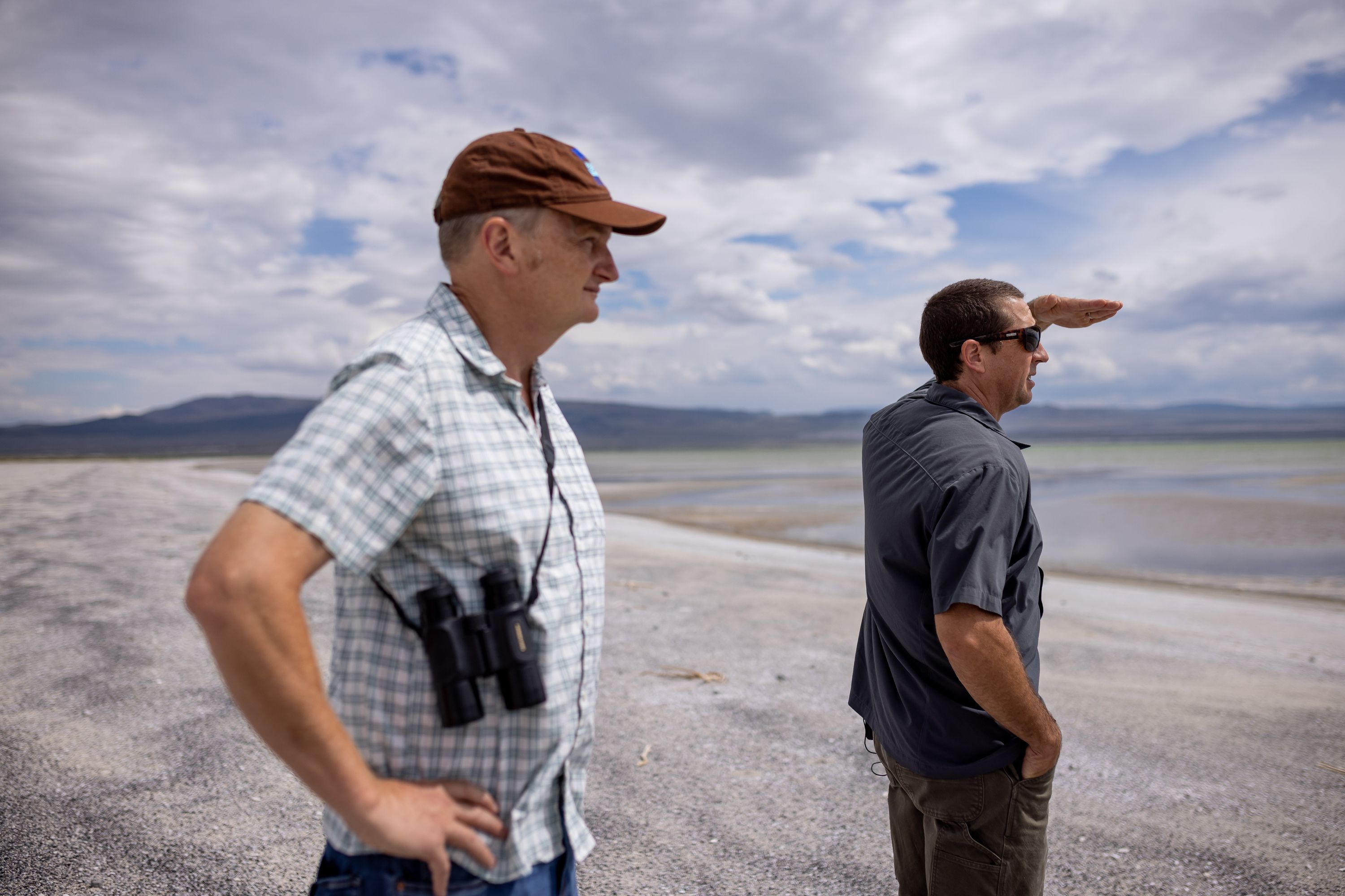 Geoffrey McQuilkin, executive director of the Mono Lake Committee, and Phill Kiddoo, air pollution control officer for the Great Basin Unified Air Pollution Control District, take journalists on a tour of the north shore of Mono Lake in Mono County, Calif., on Aug. 9.