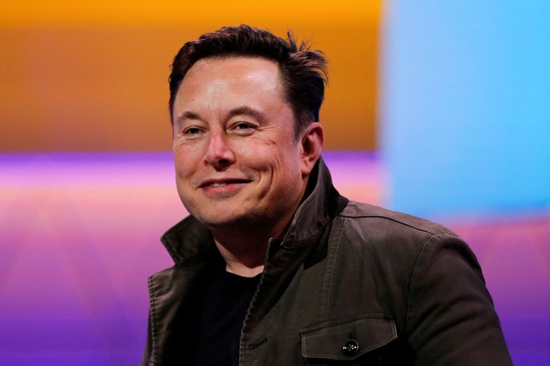SpaceX owner and Tesla CEO Elon Musk smiles at the E3 gaming convention in Los Angeles June 13, 2019. Musk has launched a perfume called "Burnt Hair" that he said sold 10,000 bottles to earn a million dollars in just a few hours.