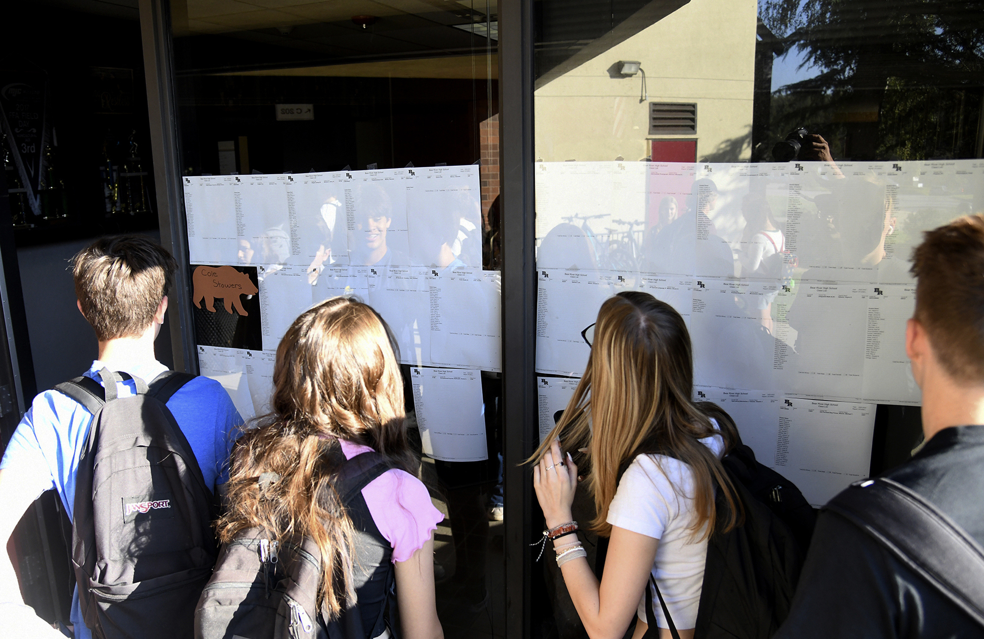 New students at Bear River High School, in Grass Valley, Calif., gather to see their school schedules during the first morning of school, Aug. 16, for the 2022-2023 school. ACT test scores made public in a report Wednesday reveal a decline in preparedness for college-level coursework. 