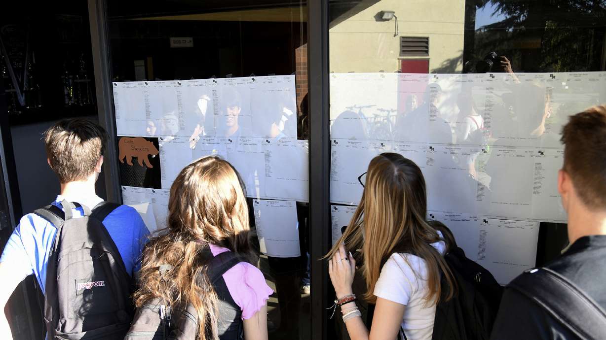 New students at Bear River High School, in Grass Valley, Calif., gather to see their school schedules during the first morning of school, Aug. 16, for the 2022-2023 school. ACT test scores made public in a report Wednesday reveal a decline in preparedness for college-level coursework.