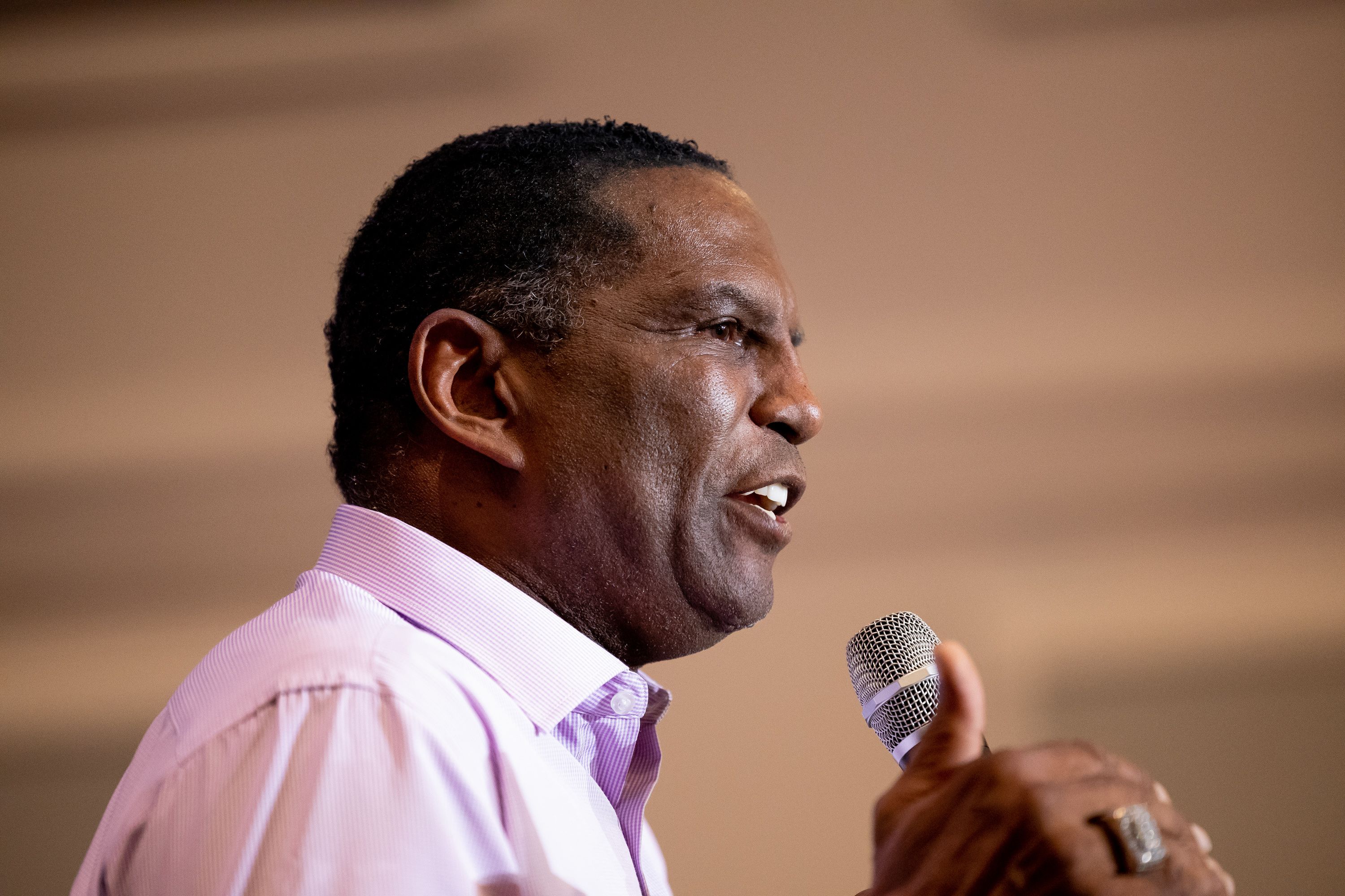 Rep. Burgess Owens, R-Utah, speaks at an event for candidates in the GOP primary election at the Awaken Event Center in South Jordan on June 28. Owens has pulled out of a debate set for Wednesday because the moderator is the executive editor of The Salt Lake Tribune, which he says ran a "racist" cartoon about him.