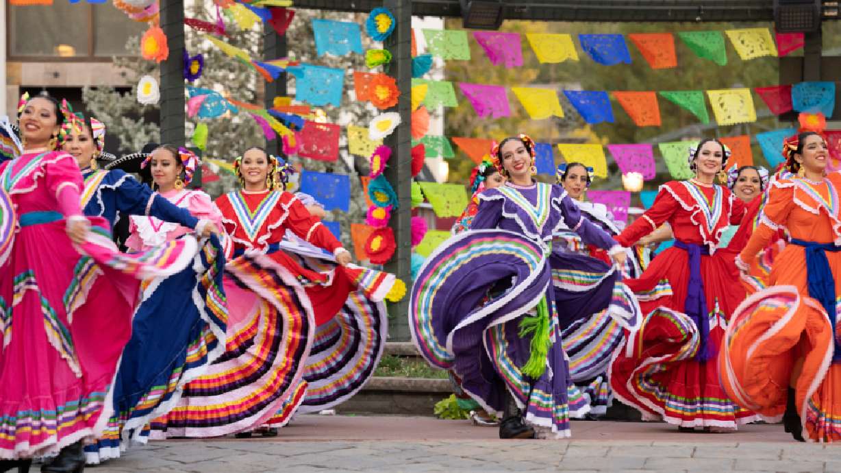 Female performers participate in a traditional dance number for "Luz de las Naciones" that was broadcasted on Nov. 20, 2021.