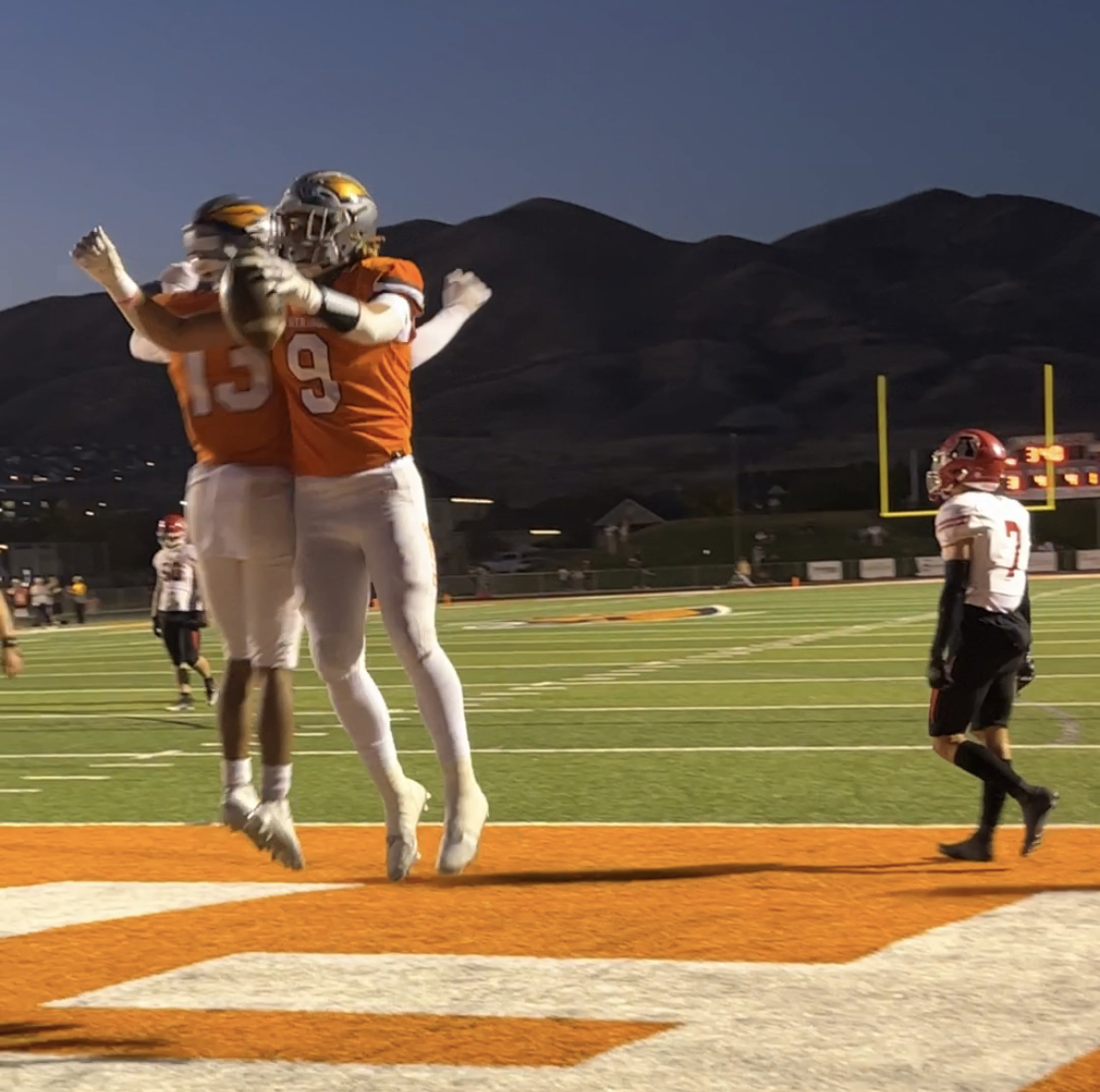 Skyridge's Josh Davis (9) celebrates a touchdown in the first quarter of the Falcons' 37-0 win over American Fork in the regular-season finale, Wednesday, Oct. 12, 2022 in Lehi.