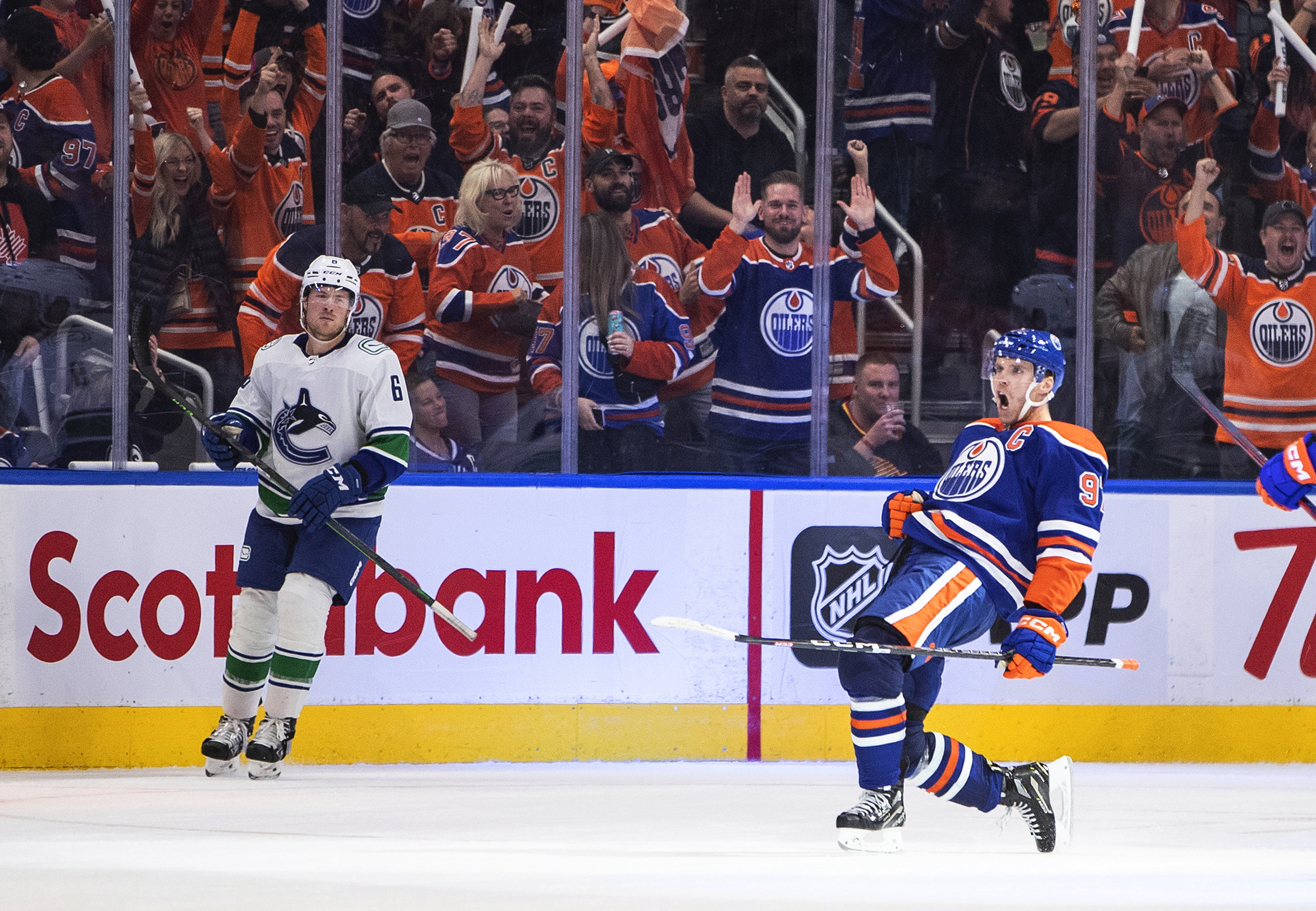 Edmonton Oilers' Connor McDavid (97) celebrates a goal against the Vancouver Canucks during the third period of an NHL hockey game Wednesday, Oct. 12, 2022, in Edmonton, Alberta. 