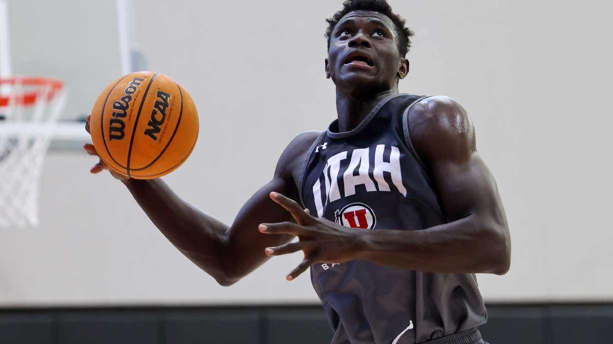 Keba Keita grabs a rebound as the University of Utah Men’s Basketball team opens camp with practice in the Jon M. and Karen Huntsman Basketball Facility in Salt Lake City on Monday, Sept. 26, 2022.