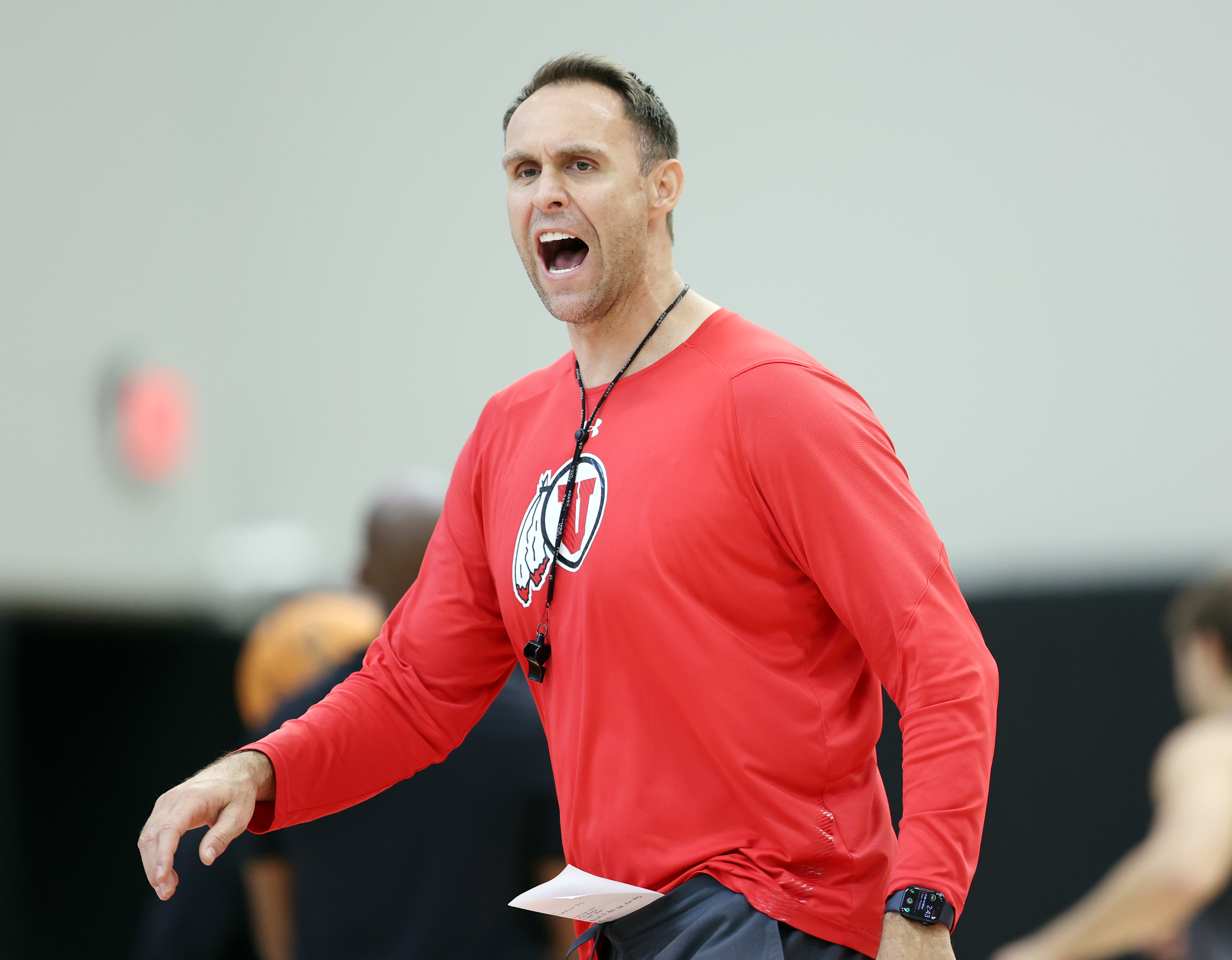 New assistant coach Chris Burgess yells out instructions as the University of Utah Men’s Basketball team opened camp with practice in the Jon M. and Karen Huntsman Basketball Facility in Salt Lake City on Monday, Sept. 26, 2022.