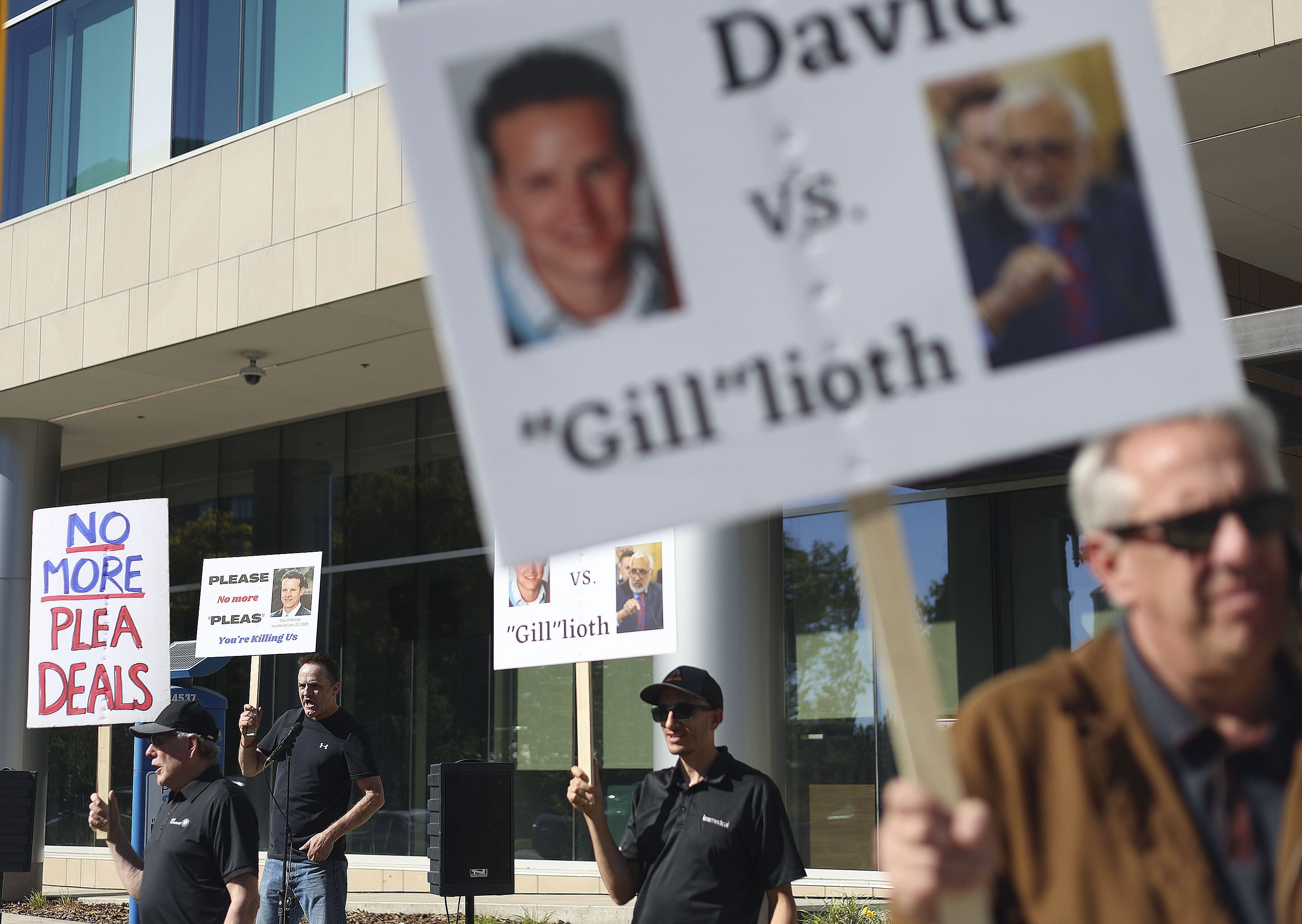 Friends and family members related to David Stokoe protest at the District Attorney’s office in Salt Lake City on Thursday. Manuel Velasquez admitted to shooting and killing Stokoe, his landlord, when Stokoe visited his rental property in 2019. The admission plea came a day before prosecutors decreased the charges from murder to manslaughter.