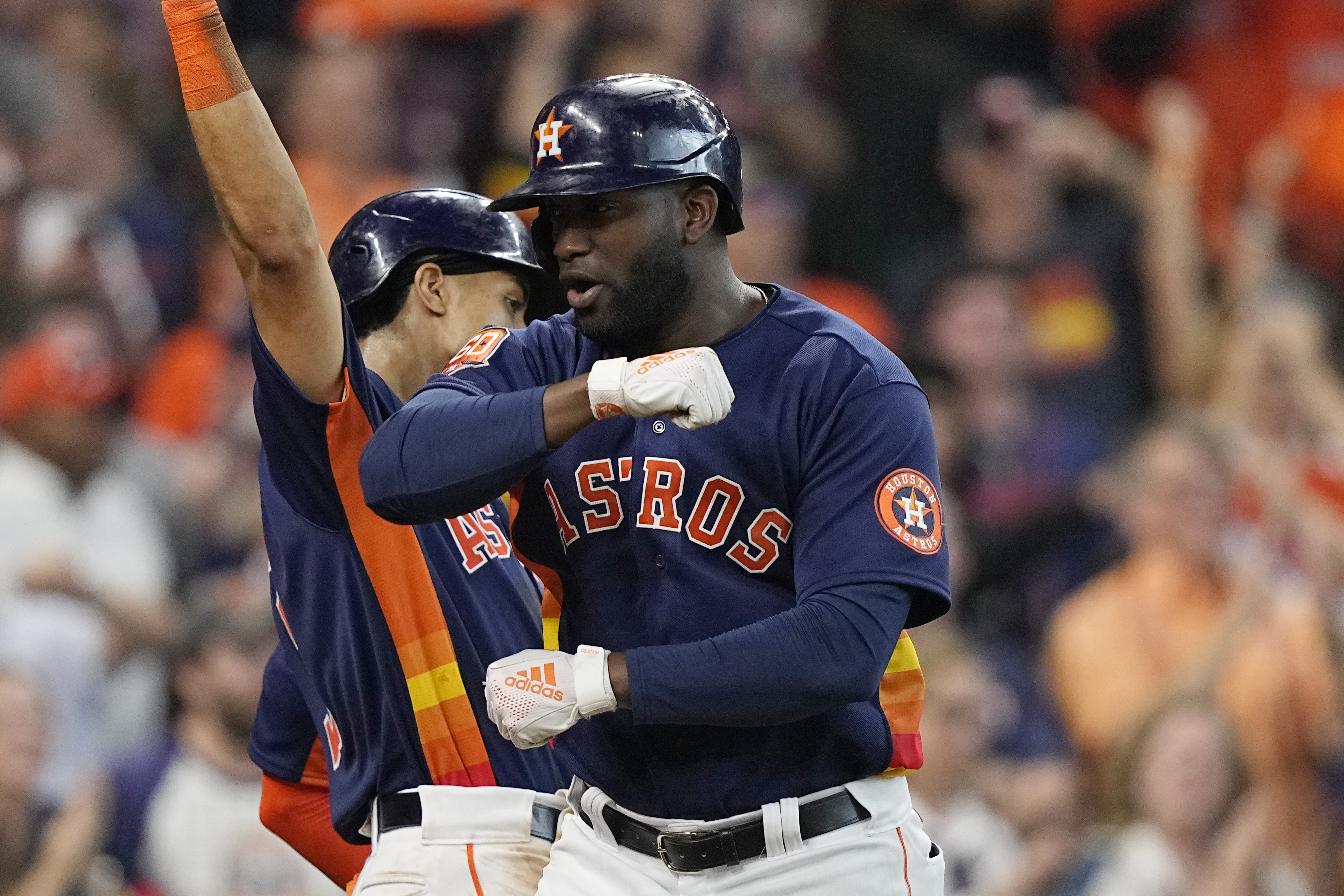 Houston Astros' Yordan Alvarez, right, celebrates his two-run home run against the Seattle Mariners with teammates during the sixth inning in Game 2 of an American League Division Series baseball game in Houston, Thursday, Oct. 13, 2022. 