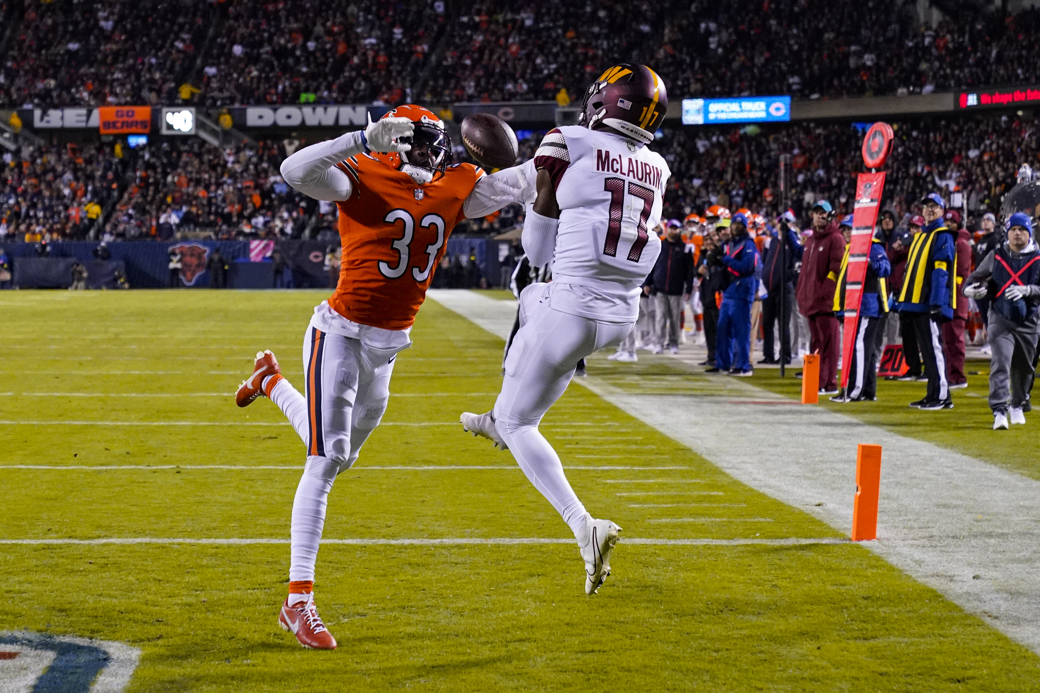 Chicago Bears cornerback Jaylon Johnson breaks up a pass intended for Washington Commanders wide receiver Terry McLaurin in the first half of an NFL football game in Chicago, Thursday, Oct. 13, 2022.