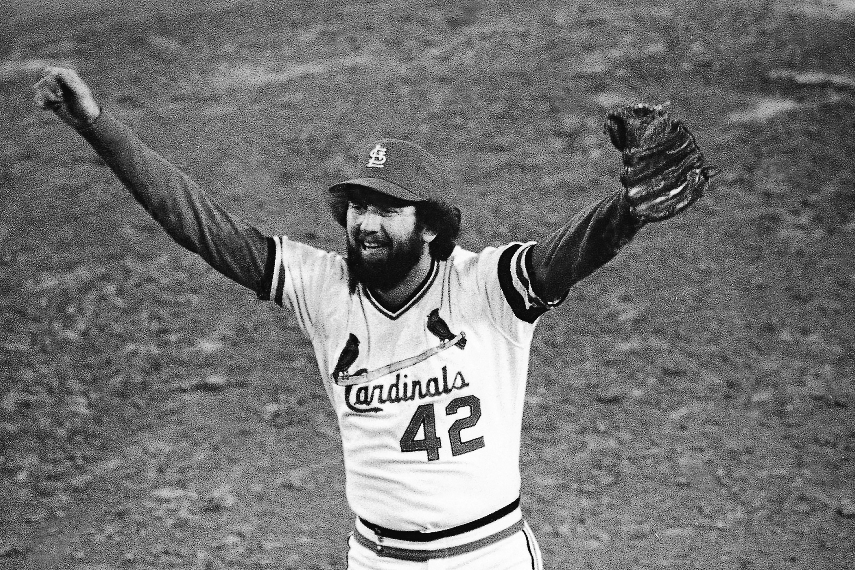 FILE - St. Louis Cardinals ace reliever Bruce Sutter celebrates after the last out in the ninth inning of Game 7 of the World Series at St. Louis, Oct. 20, 1982. Hall of Fame reliever and 1979 Cy Young winner Bruce Sutter has died. He was 69. Major League Baseball and the St. Louis Cardinals announced Sutter’s death on Friday, Oct. 14, 2022. The Baseball Hall of Fame says Sutter died Thursday in Cartersville, Georgia.  