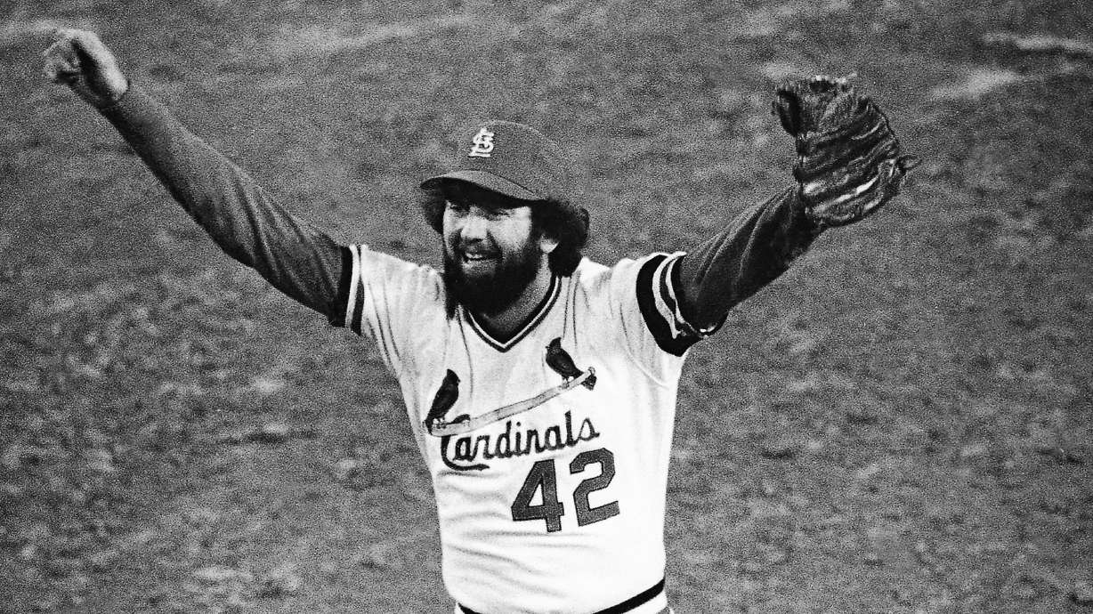 FILE - St. Louis Cardinals ace reliever Bruce Sutter celebrates after the last out in the ninth inning of Game 7 of the World Series at St. Louis, Oct. 20, 1982. Hall of Fame reliever and 1979 Cy Young winner Bruce Sutter has died. He was 69. Major League Baseball and the St. Louis Cardinals announced Sutter’s death on Friday, Oct. 14, 2022. The Baseball Hall of Fame says Sutter died Thursday in Cartersville, Georgia.
