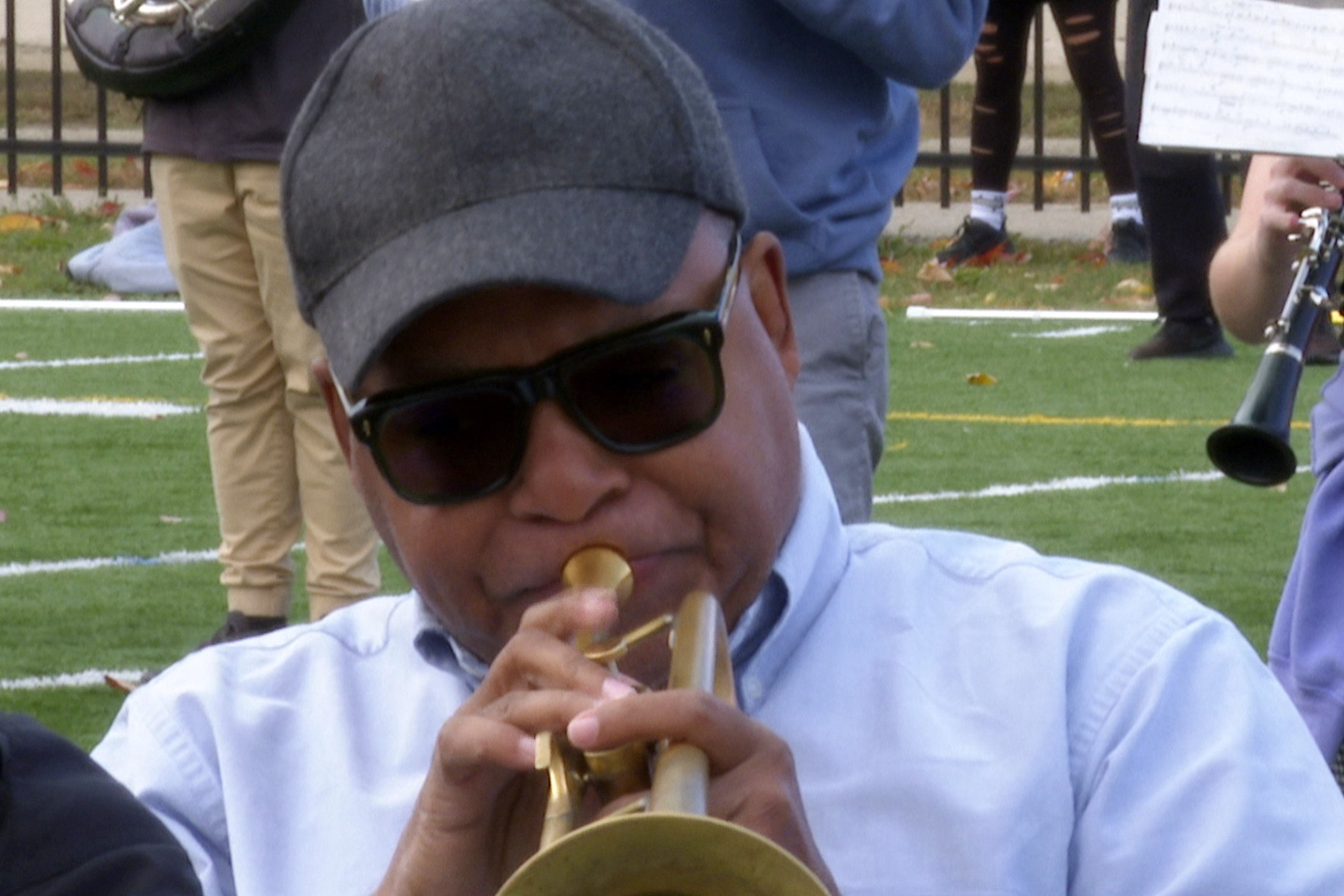 In this image made from video, Wynton Marsalis plays the trumpet during a rehearsal with the Michigan Marching Band on Thursday, Oct. 13, 2022, in Ann Arbor, Mich. The Grammy and Pulitzer winner is taking part in a week-long residency at the University of Michigan. 