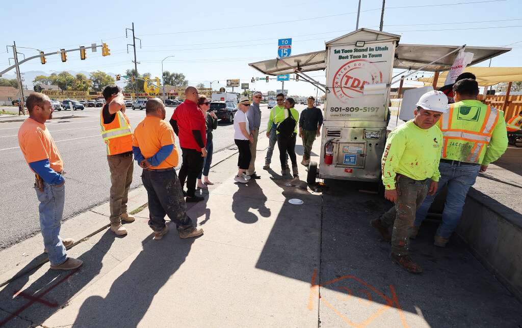 Customers stand in line at Tacos Don Rafa on State Street on Oct. 14.