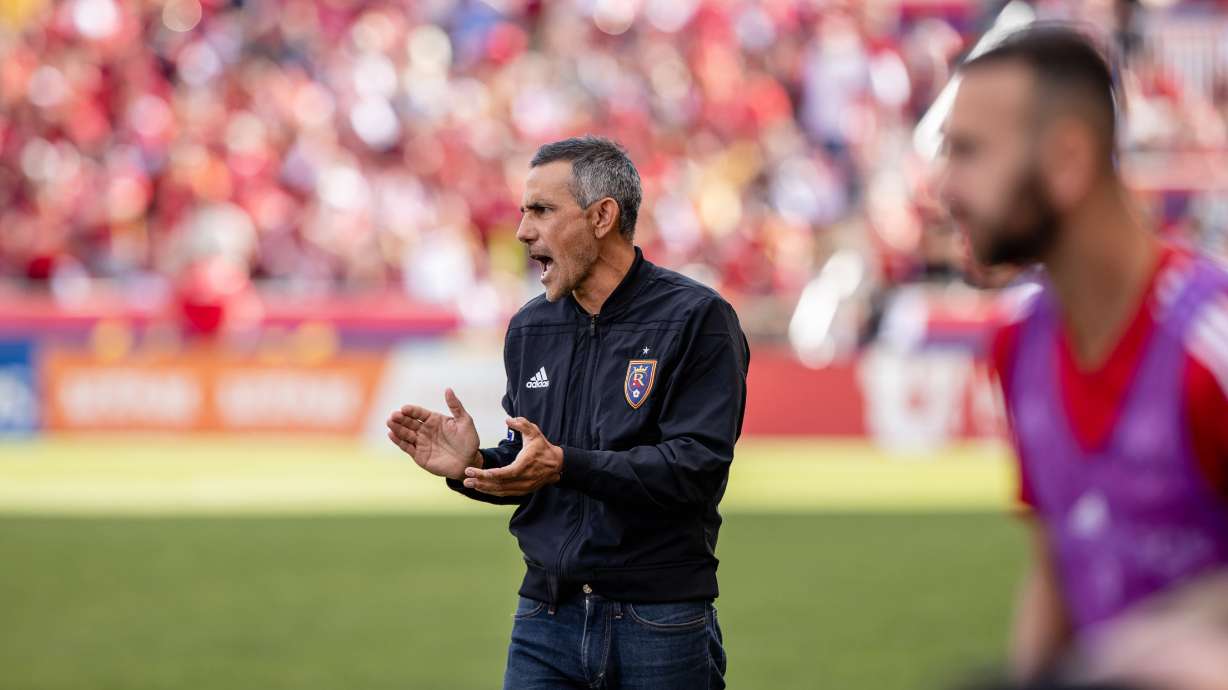 Head coach Pablo Mastroeni cheers his team on against Portland on Oct. 9.